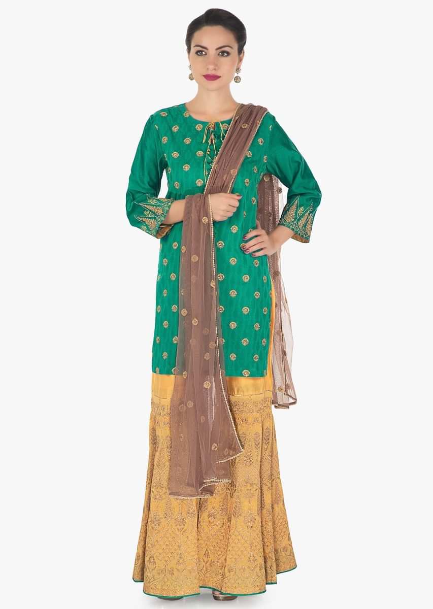 Rama green straight suit with yellow palazzo pant and contrast grey net dupatta only on Kalki