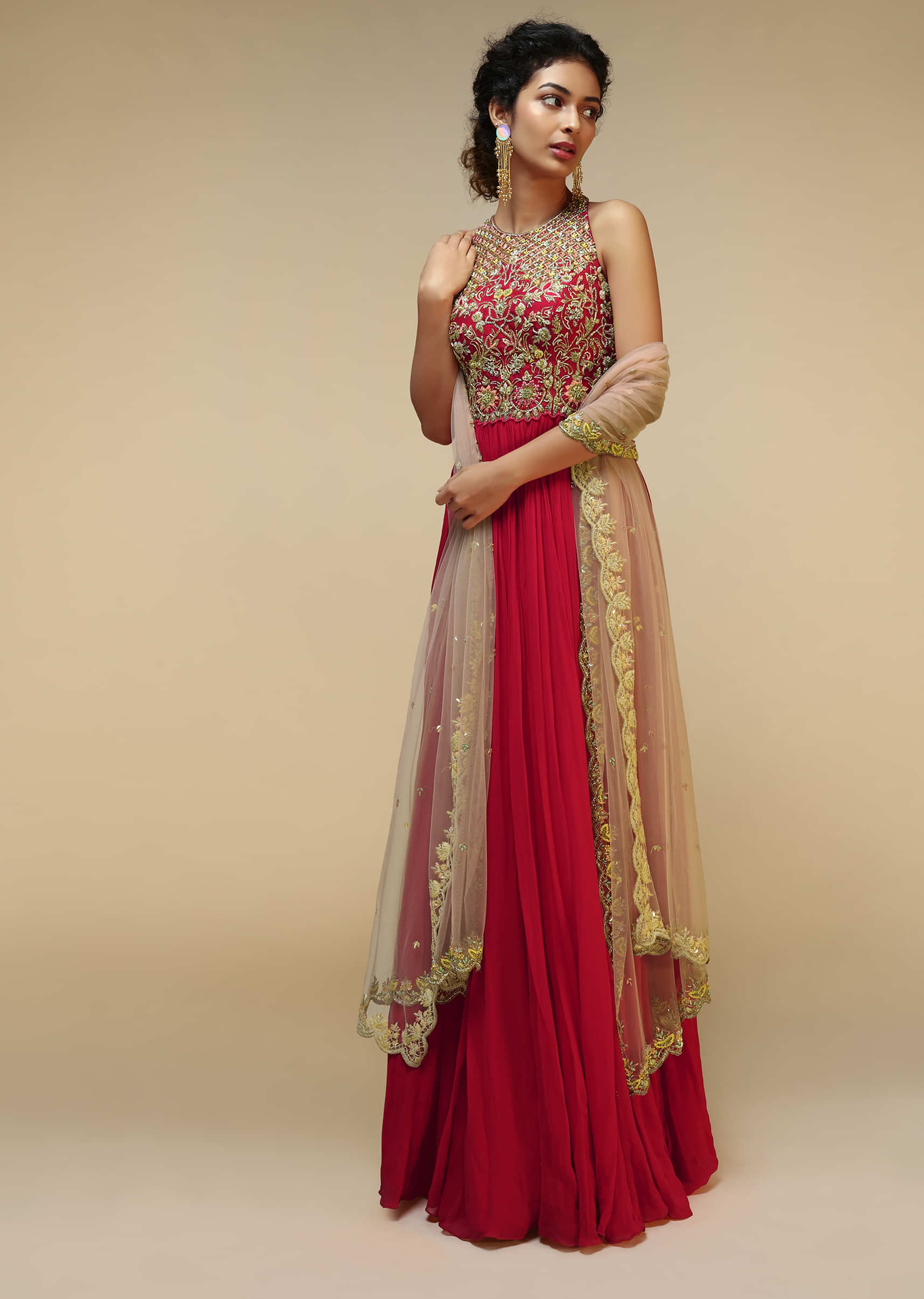 Rani Pink Anarkali Suit With Halter Neckline And Adorned In Multicolored Hand Embroidered Floral Design On The Bodice  