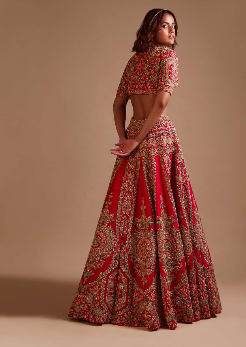 Rani Pink Lehenga Choli In Raw Silk With Hand Embroidered Heritage Floral Kalis Using Colorful Sequins And Beads 