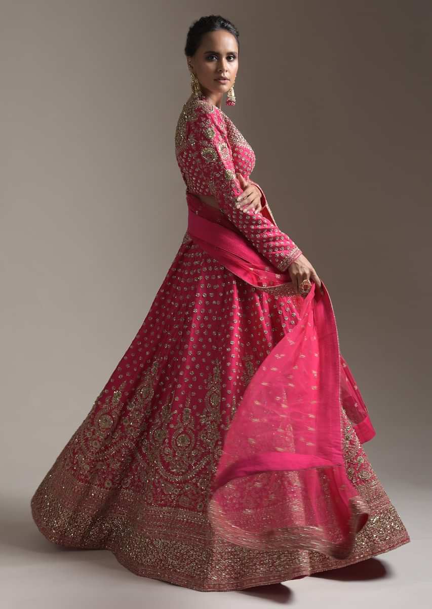 Rani Pink Lehenga Choli In Raw Silk With Heavy Embroidery Work In Heritage Floral Design And Butti Work