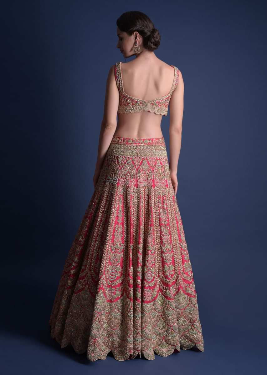 Fuschia Rose Lehenga Choli With Heavy Embossed Floral Embroidery In Kali Pattern 