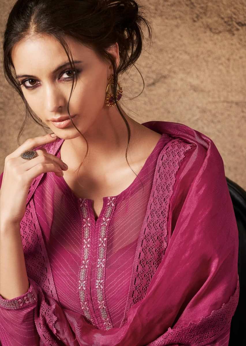 Rani pink unstitched suit in resham embroidered placket and hem line