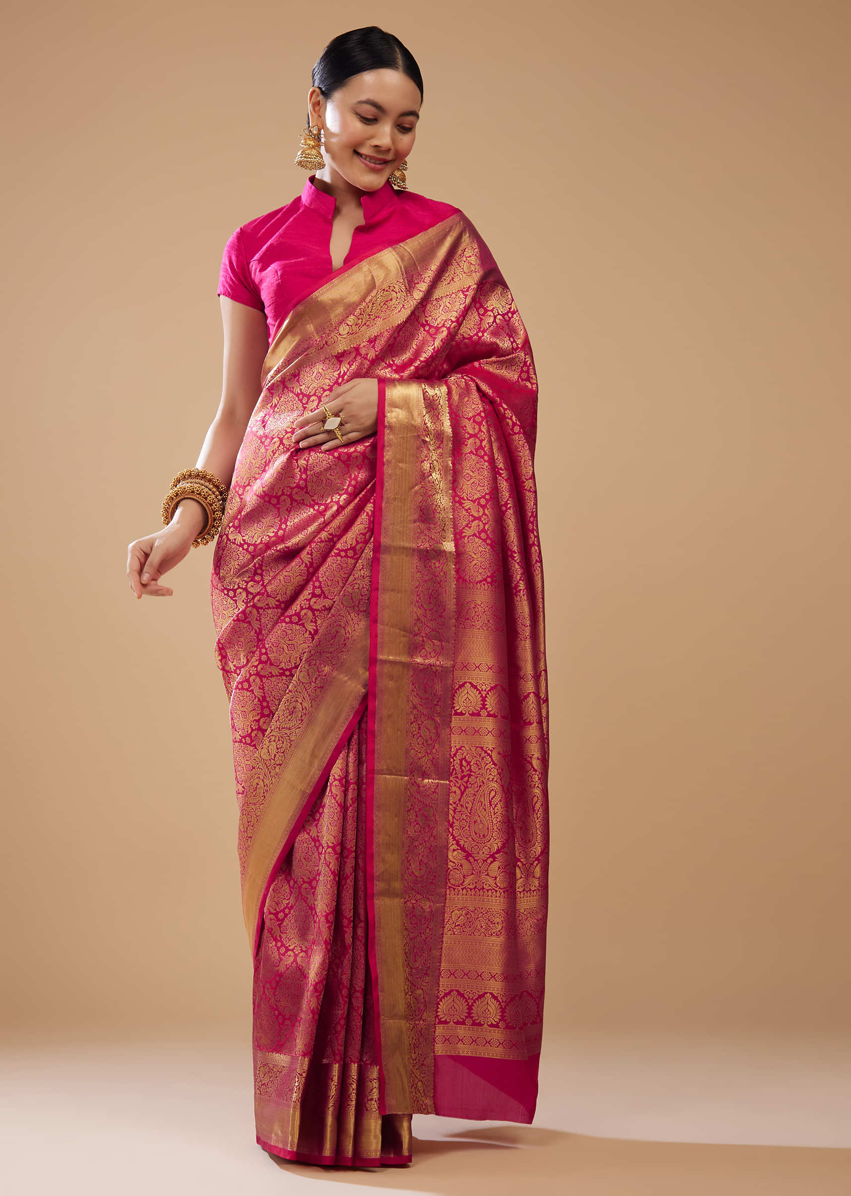 Rani Pink Intricately Weaved Kanjivaram Silk Saree