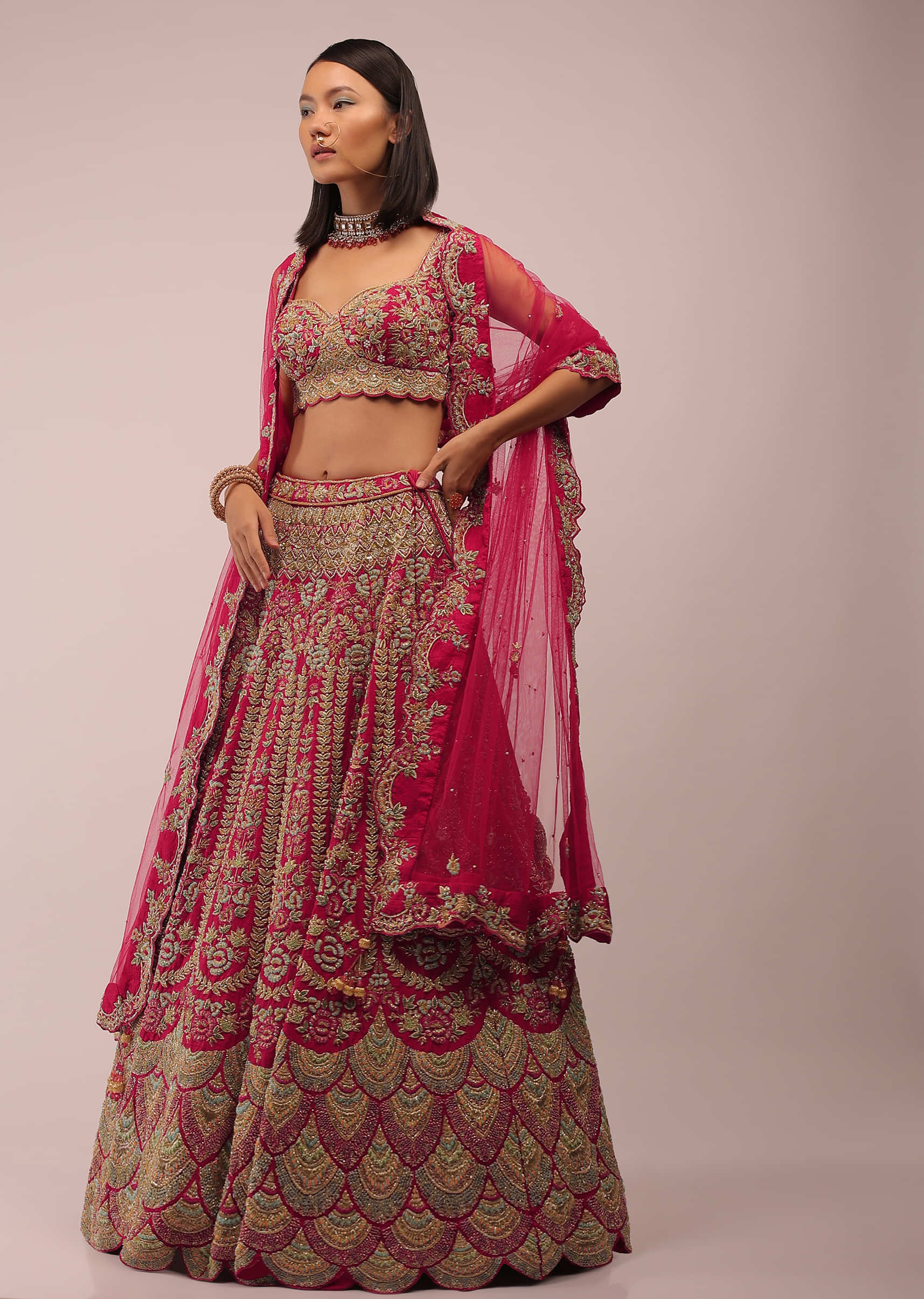 Rani Pink Lehenga In Mughal Inspired Architecture Embroidery In Kalidar Motifs,Crafted In Raw Silk With Multi Color Beads,And Zardozi In Scallops