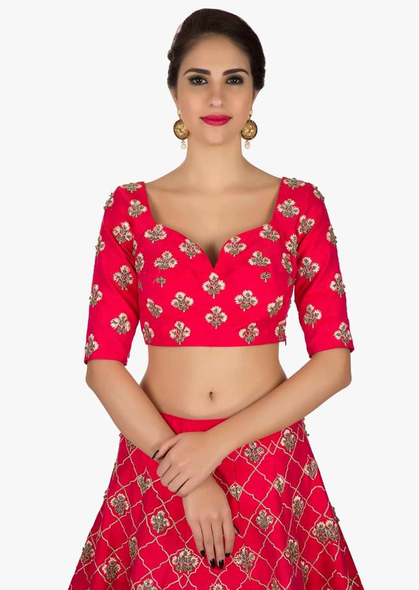 Rani pink lehenga in silk with a ready blouse flaunting the zari zardosi work only on Kalki