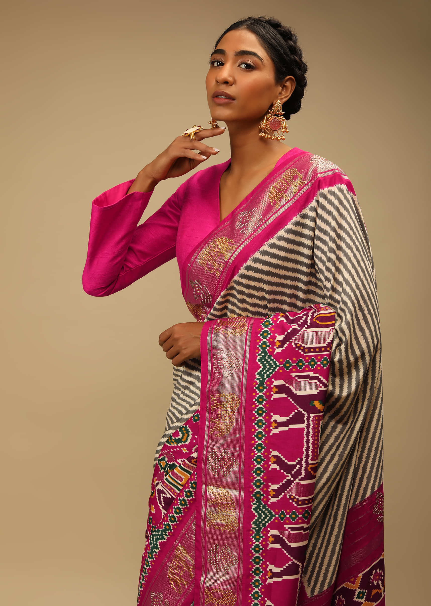 Rani Pink Patola Saree In Soft Silk With Brown And White Stripes And Stick On Kundan Work  