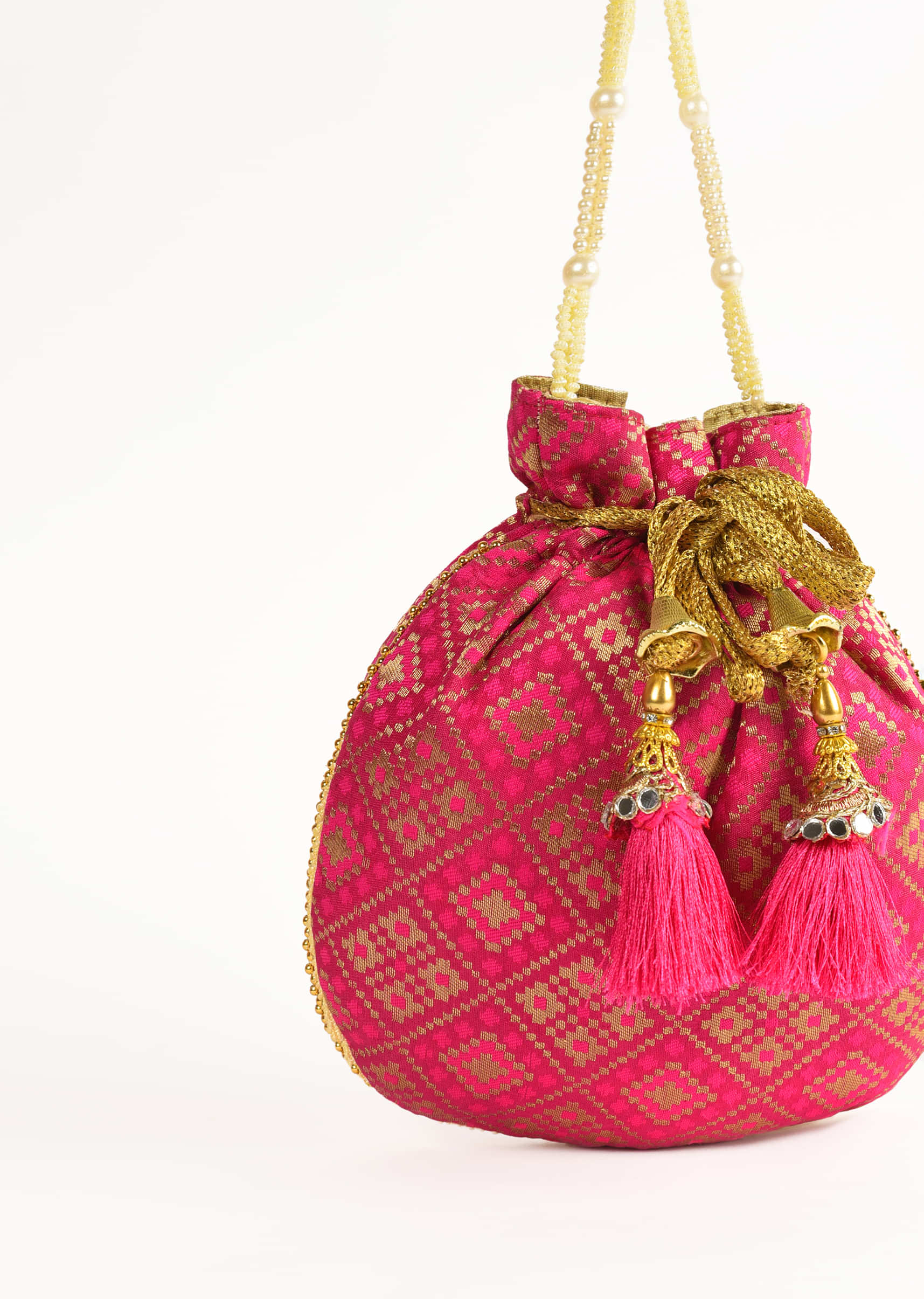 Rani Pink Potli Bag In Brocade Silk With Geometric Jaal Design Online - Kalki Fashion