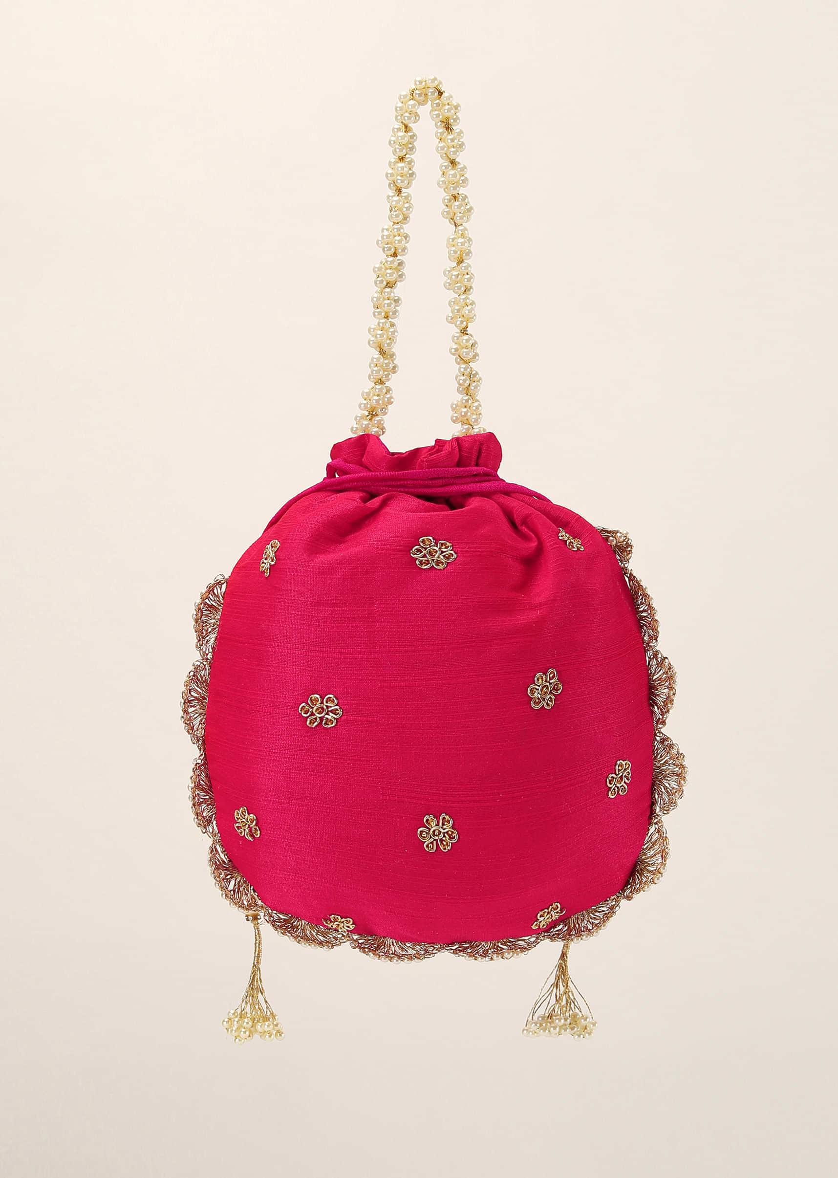 Rani Pink Potli In Raw Silk With Hand Embroidery Detailing Using Zardosi Work In Floral Design All Over