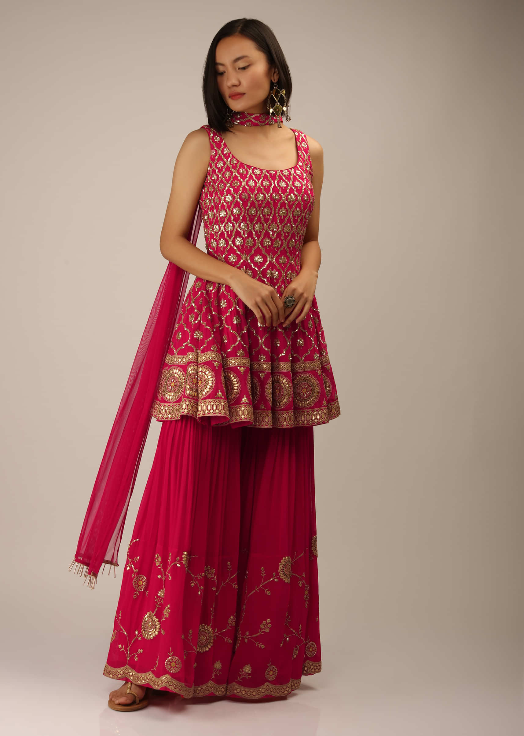 Rani Pink Sharara And Peplum Suit With Moroccan Jaal Embroidery And Gotta Highlights