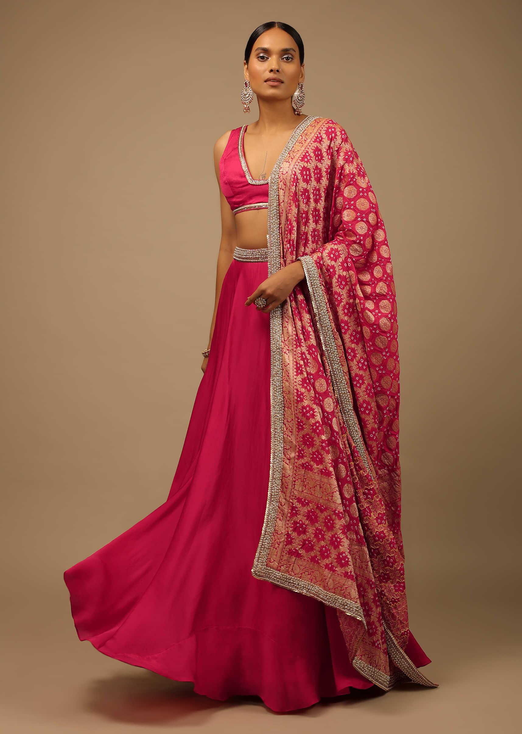 Rani Pink Skirt And Crop Top Set With A Bandhani Brocade Dupatta Edged In Moti Work