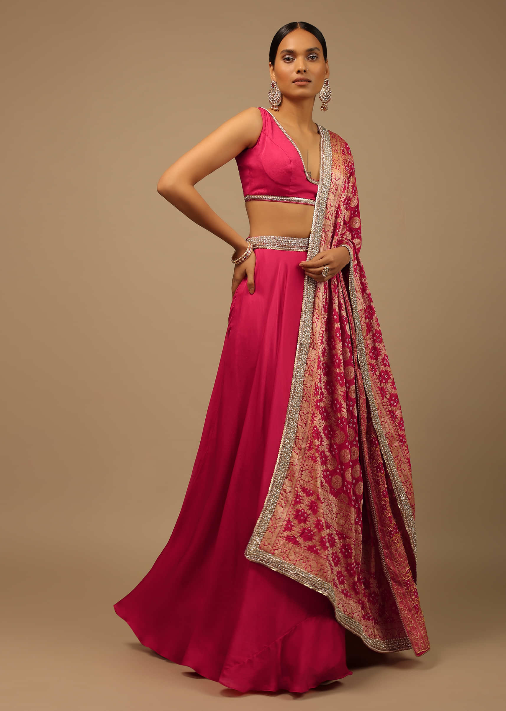 Rani Pink Skirt And Crop Top Set With A Bandhani Brocade Dupatta Edged In Moti Work