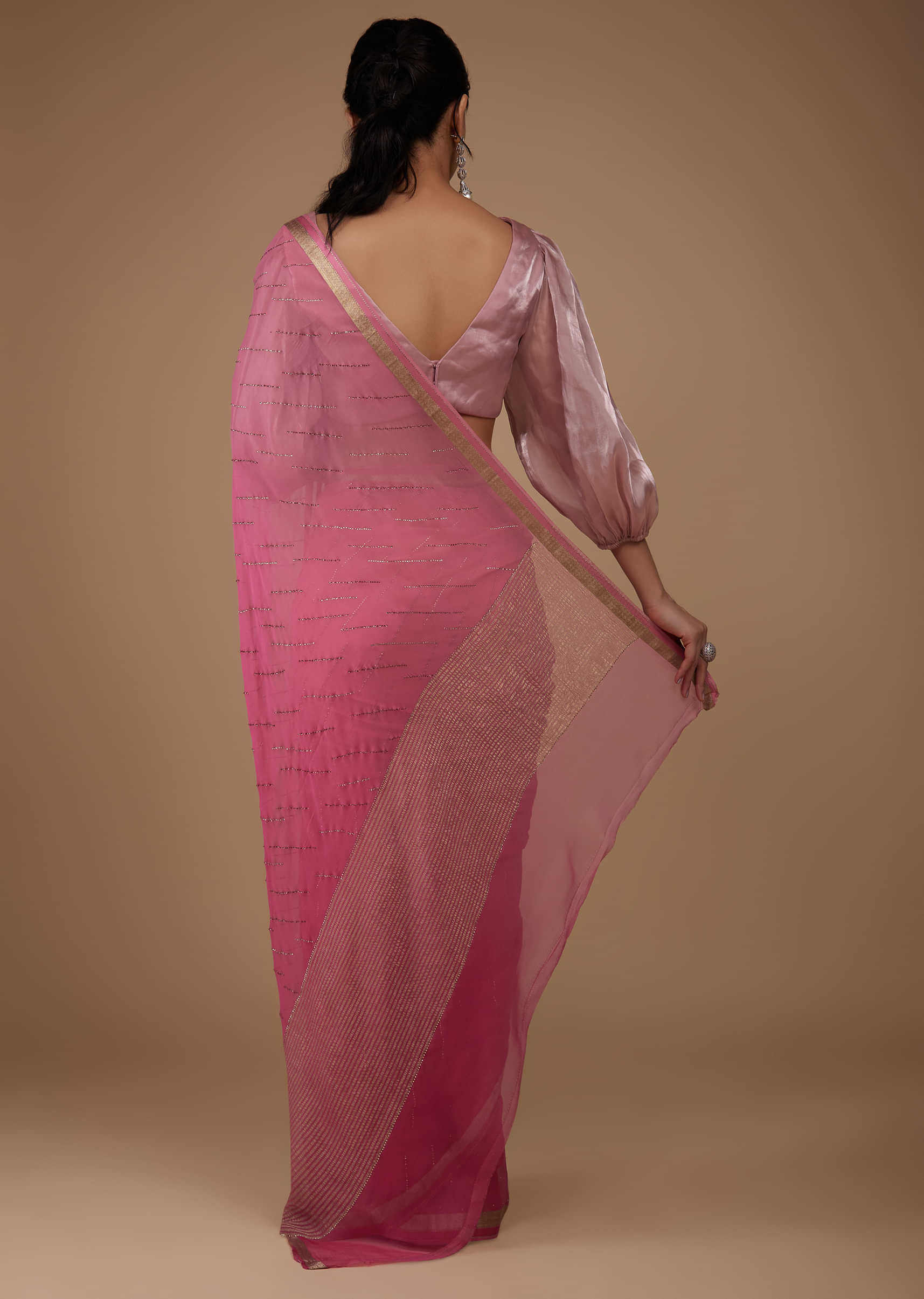 Rouge Pink Chiffon Saree With Swarovski Stone Embellishments And Zari Border