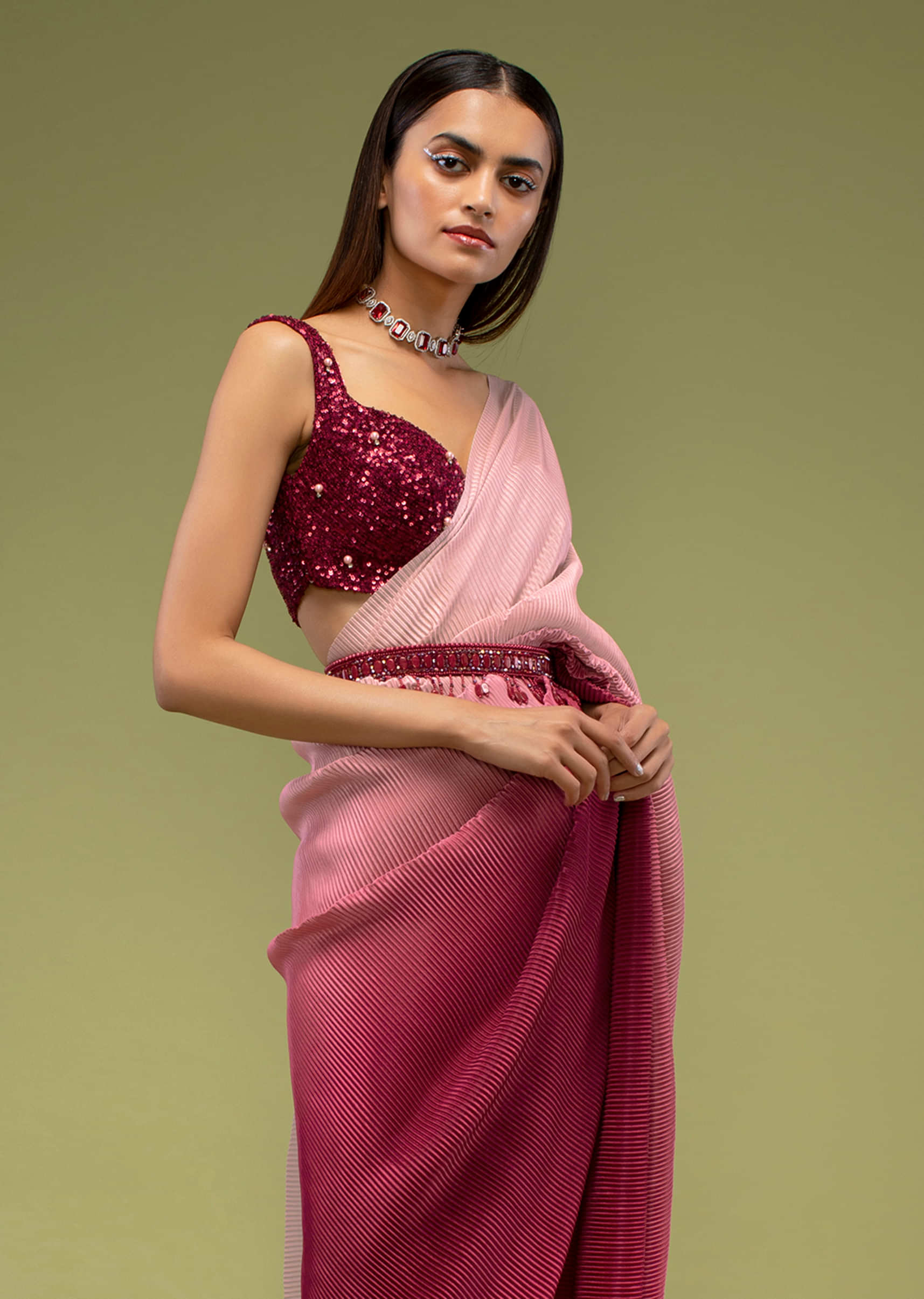 Raspberry Red Ombre Saree And A Crop Top In Sequins Embroidery, Paired With The Crop Top In Sleeveless And A Sweet Heart Neckline