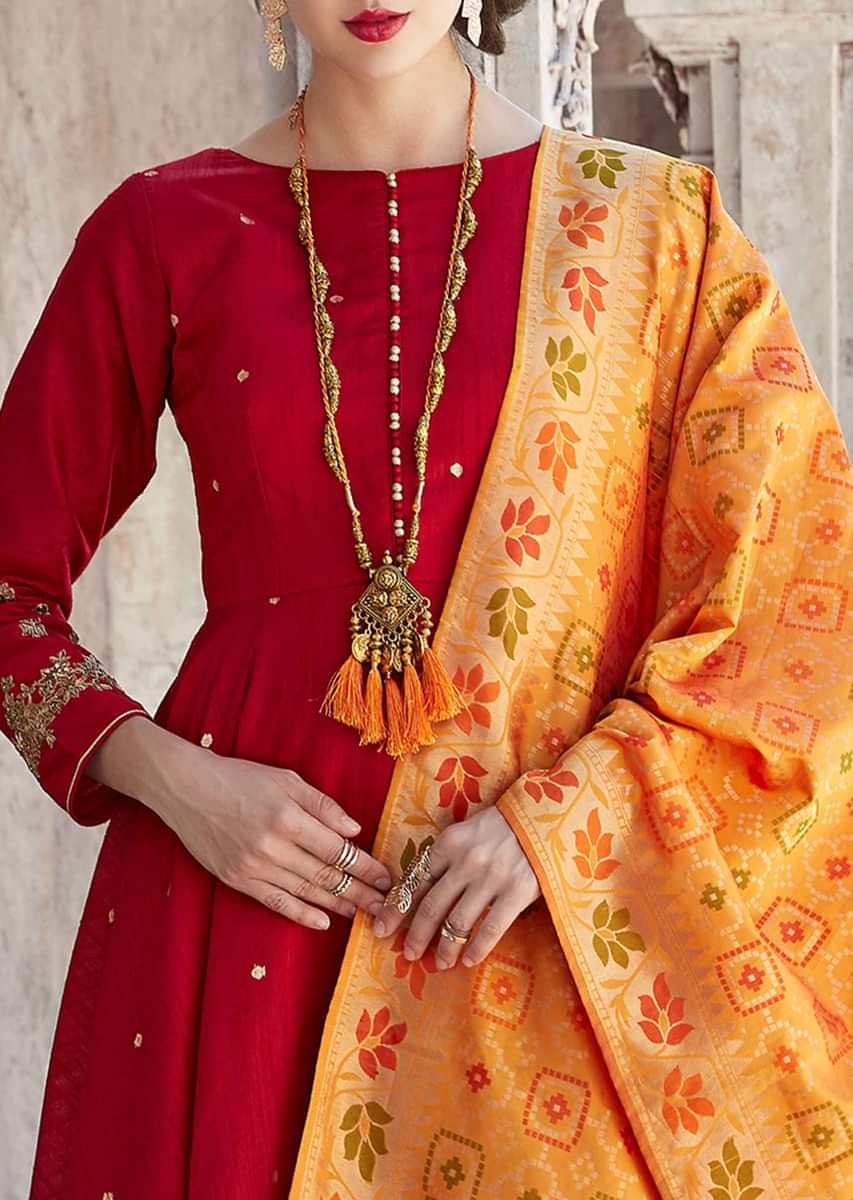 Red Anarkali Suit In Fancy Potli Buttons With Mustard Brocade Dupatta Online - Kalki Fashion