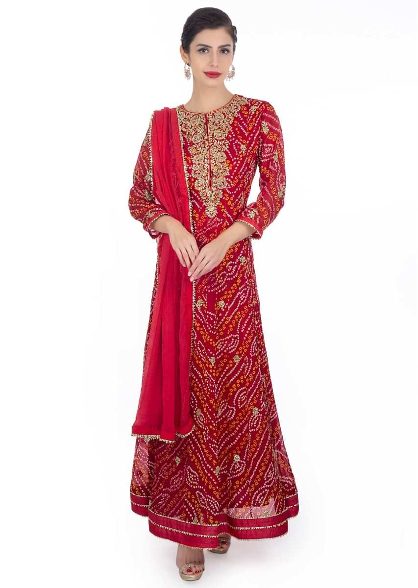 Red bandhani georgette anarkali suit paired with rani pink chiffon dupatta with lace border
