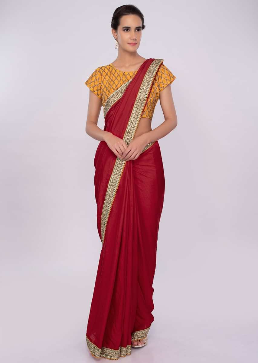 Red cotton silk saree with contrasting chrome yellow blouse only on kalki