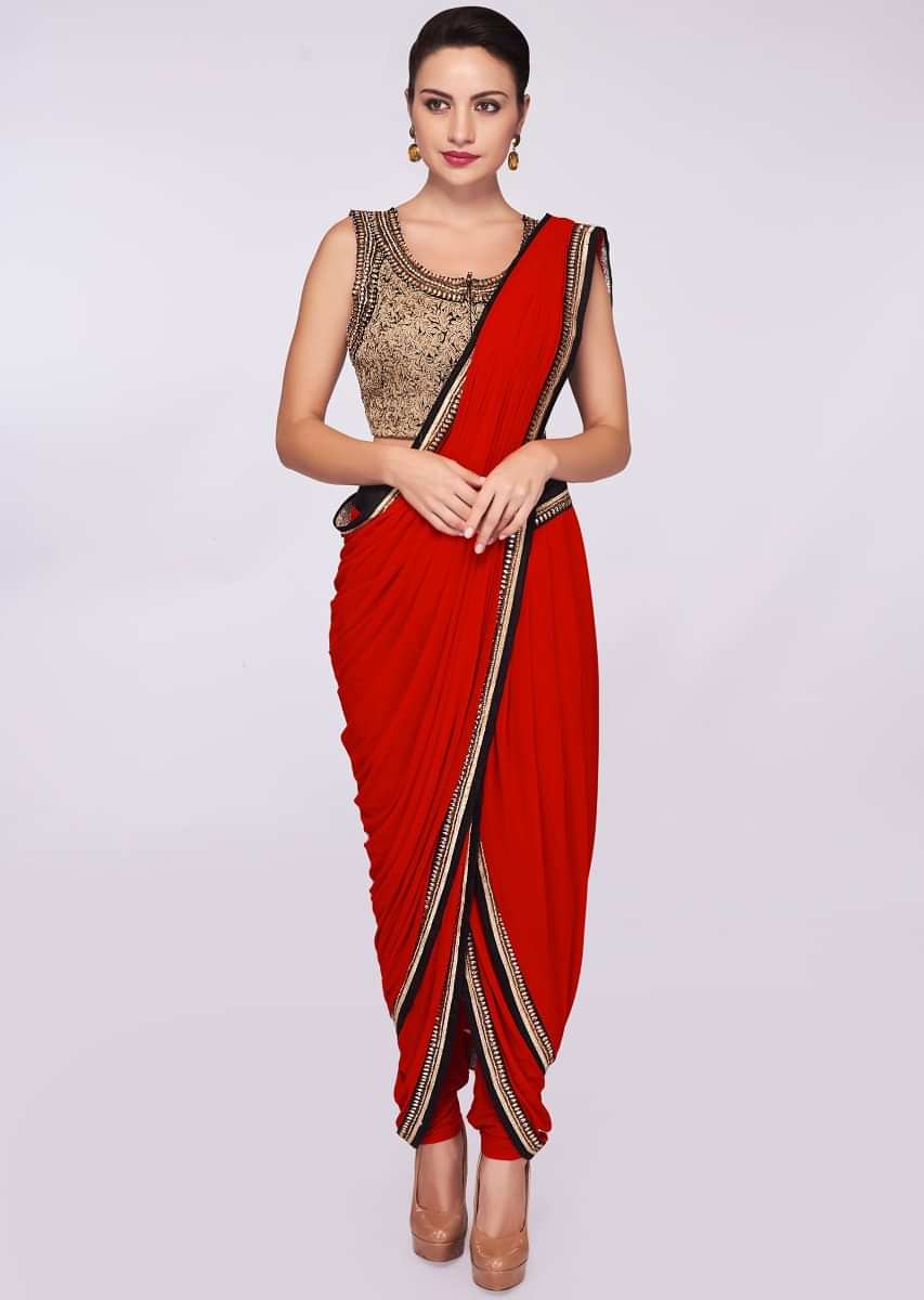 Red lycra dhoti saree paired with fancy fabric blouse 