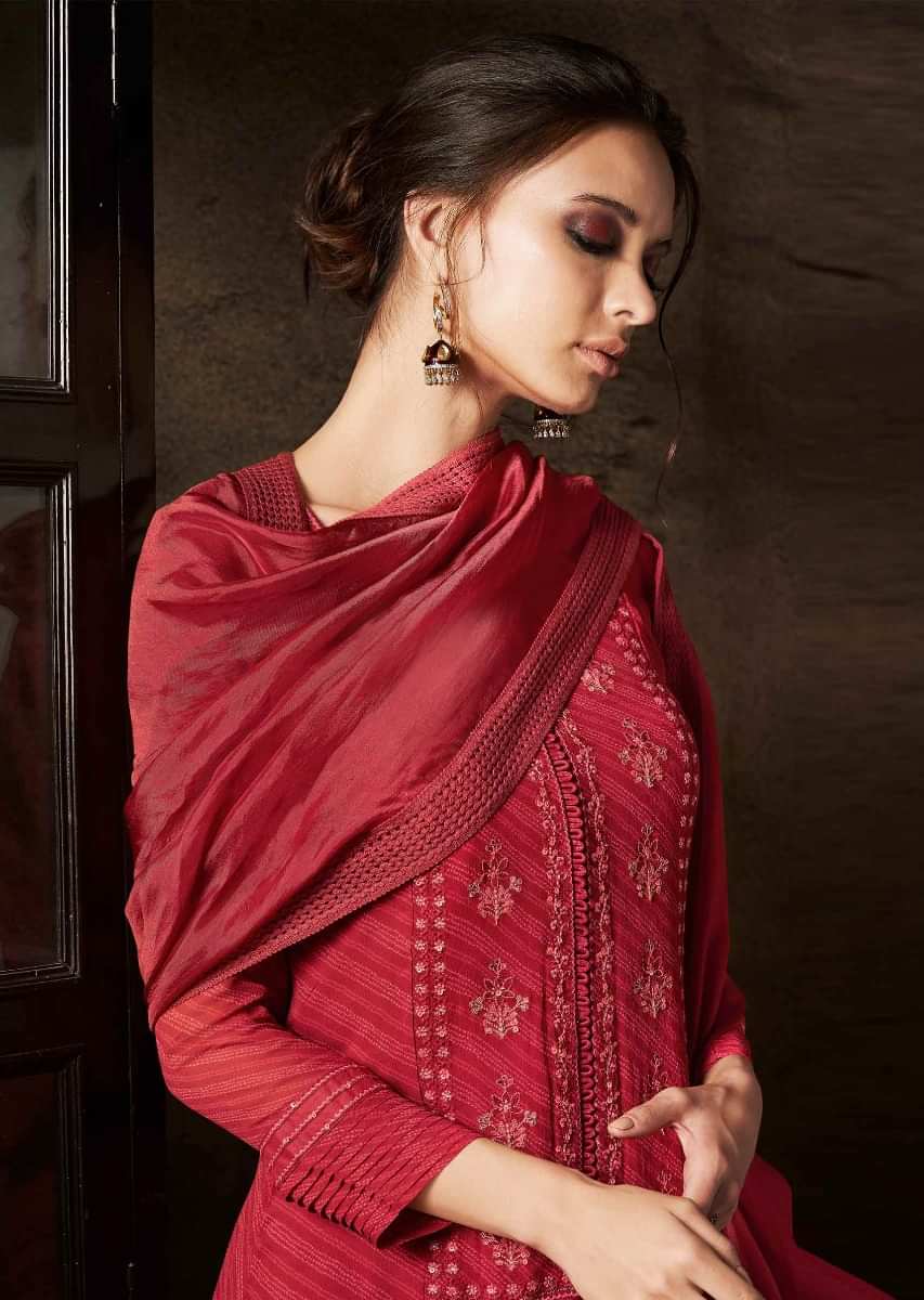Red unstitched suit in resham embroidered bodice and kali
