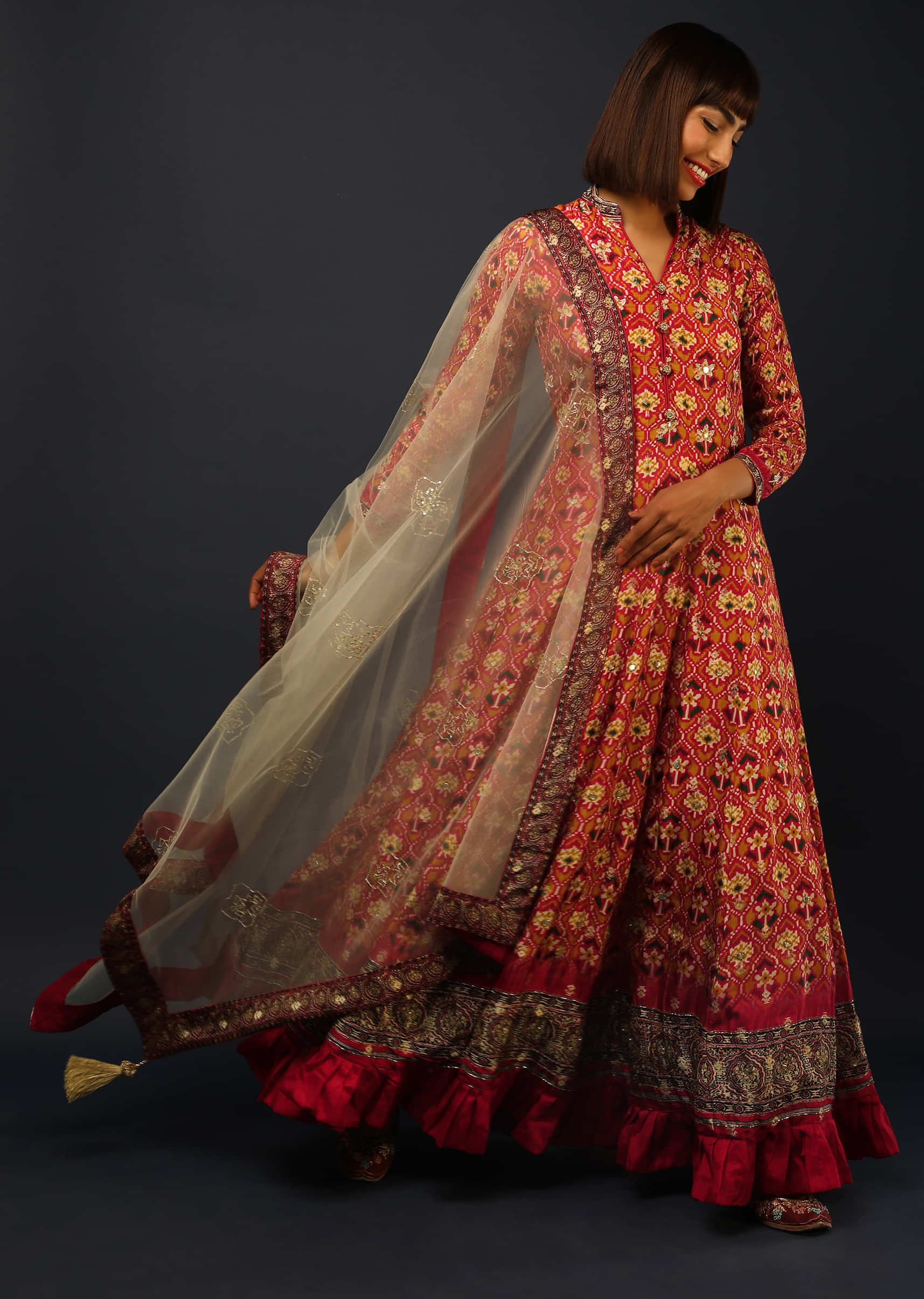 Red And Mustard Anarkali Suit In Brocade Silk With Patola Print All Over  