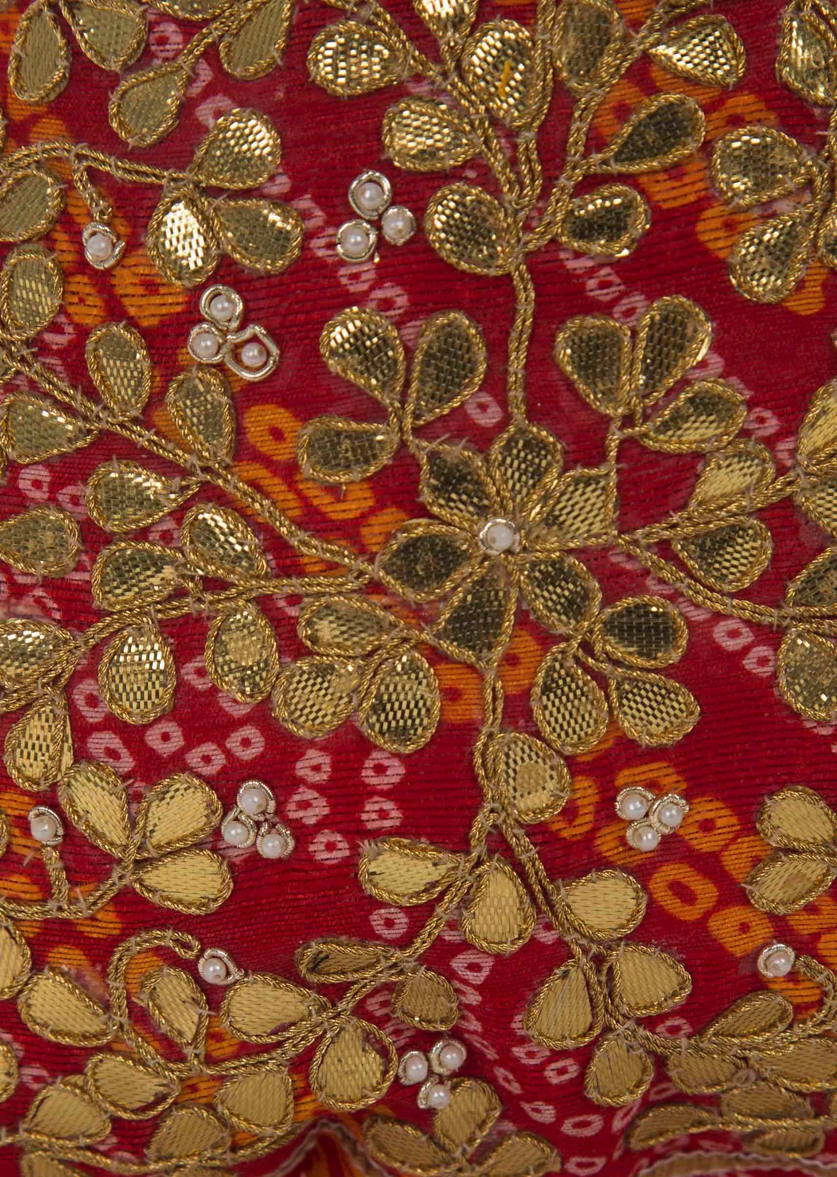 Red bandhani potli bag beautified in gotta patti embroidered work only on Kalki