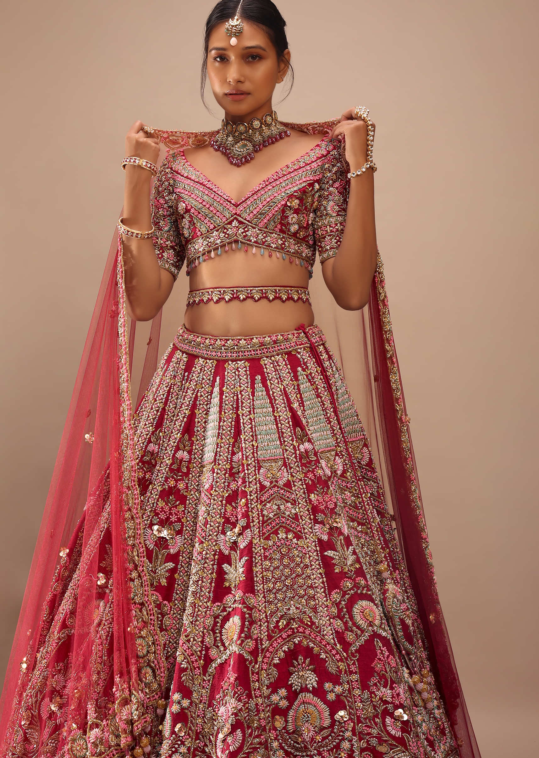 Red Raw Silk Lehenga Choli With Hand Embroidered Multicolored Heritage Kalis And Embossed Floral Motifs