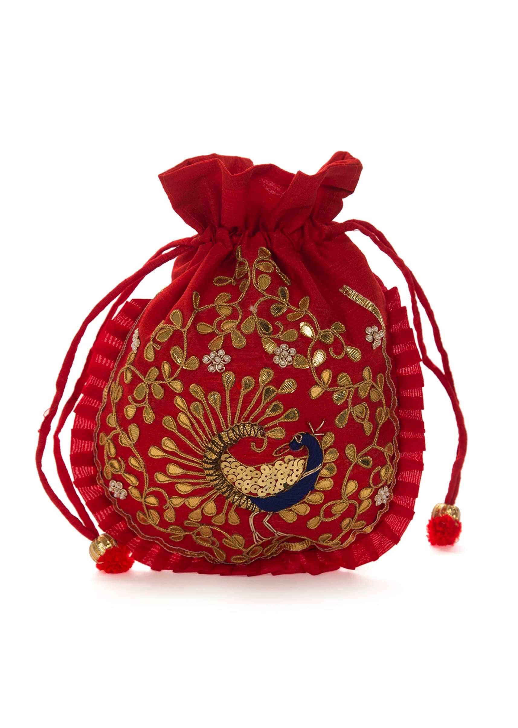 Red potli bag beautified in gotta patti embroidered work only on Kalki