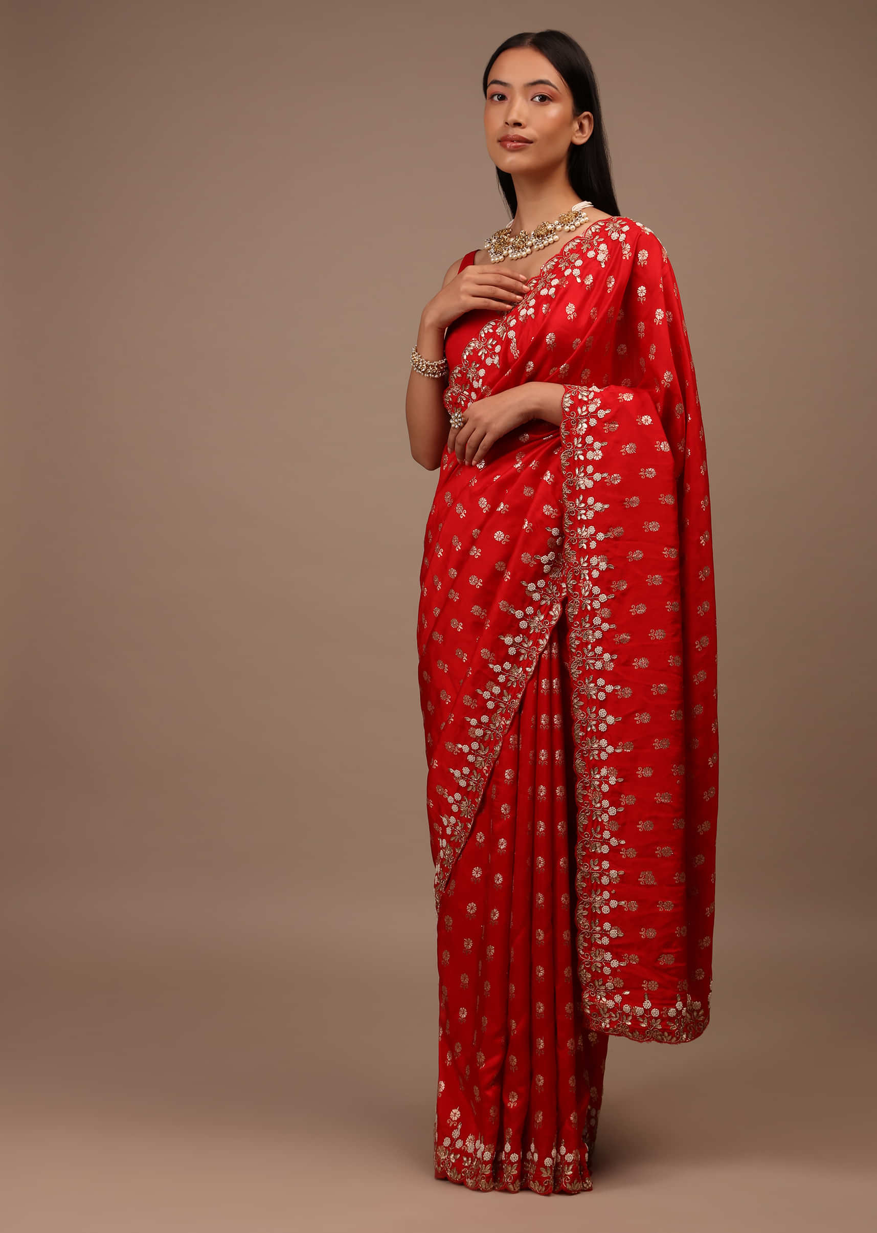 Red Saree In Silk With Brocade Woven Floral Buttis And Moti Embroidered Border Design