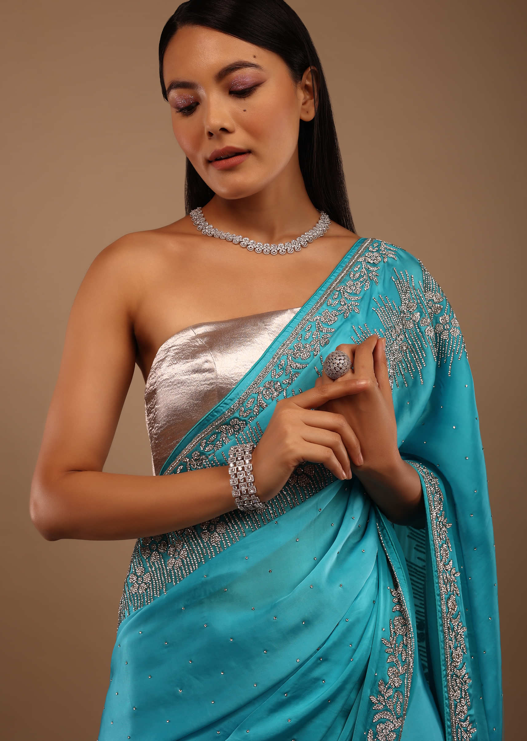 River Blue Satin Saree With Swarovski Stone Work In A Floral Pattern