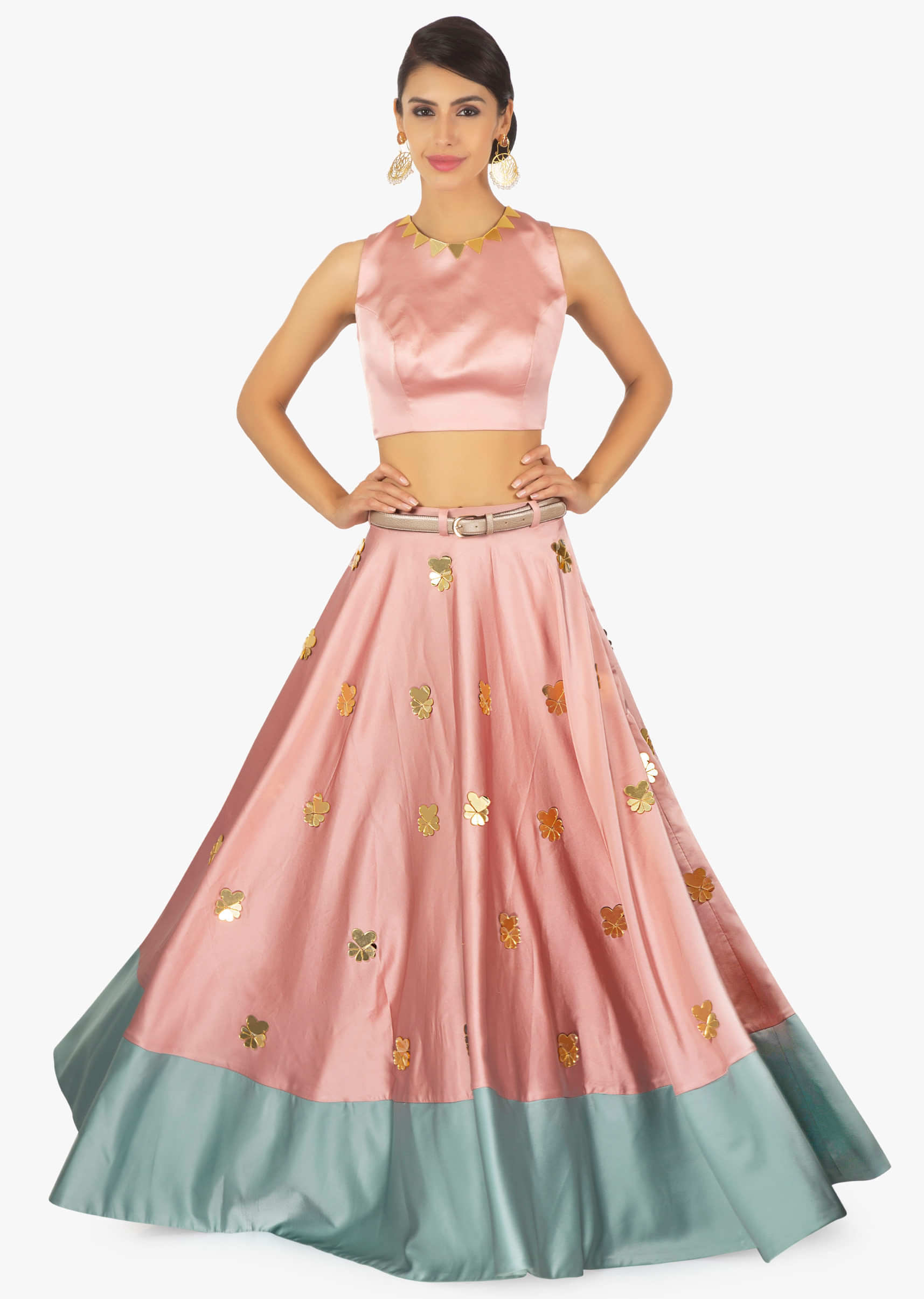 Rose pink crop top pared with a rose pink and turq green skirt