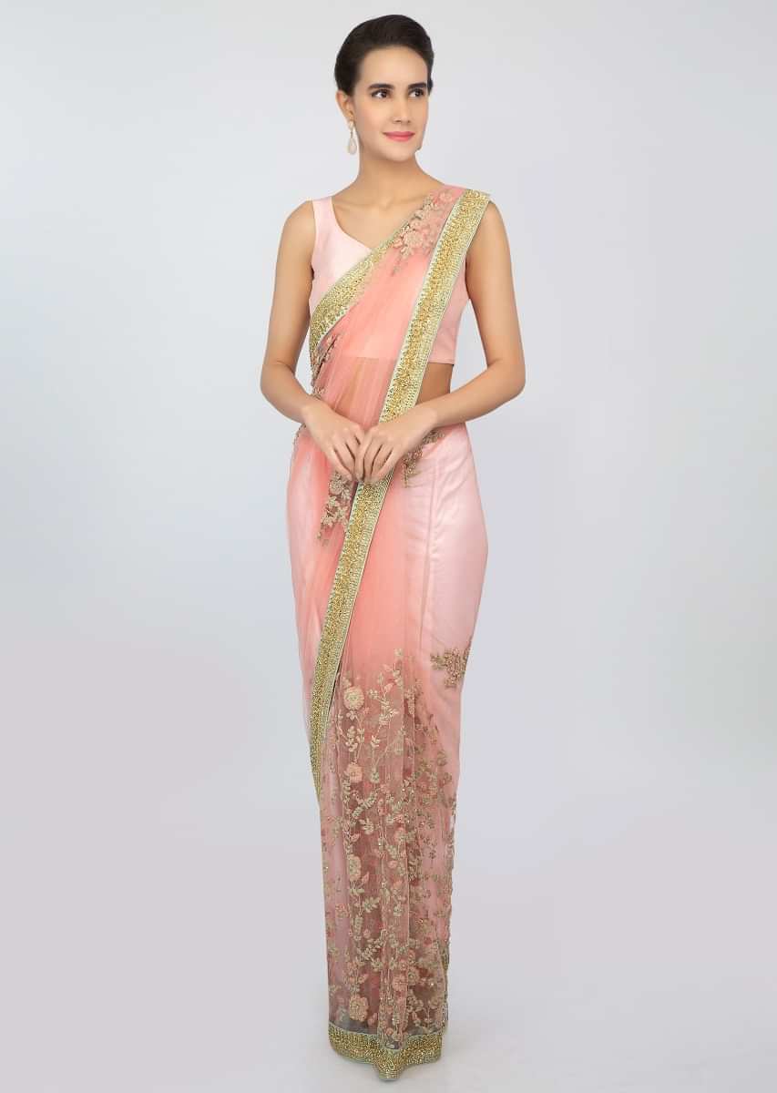 Rose pink sheer net saree with floral embroidered lower bottom and pallo only on kalki