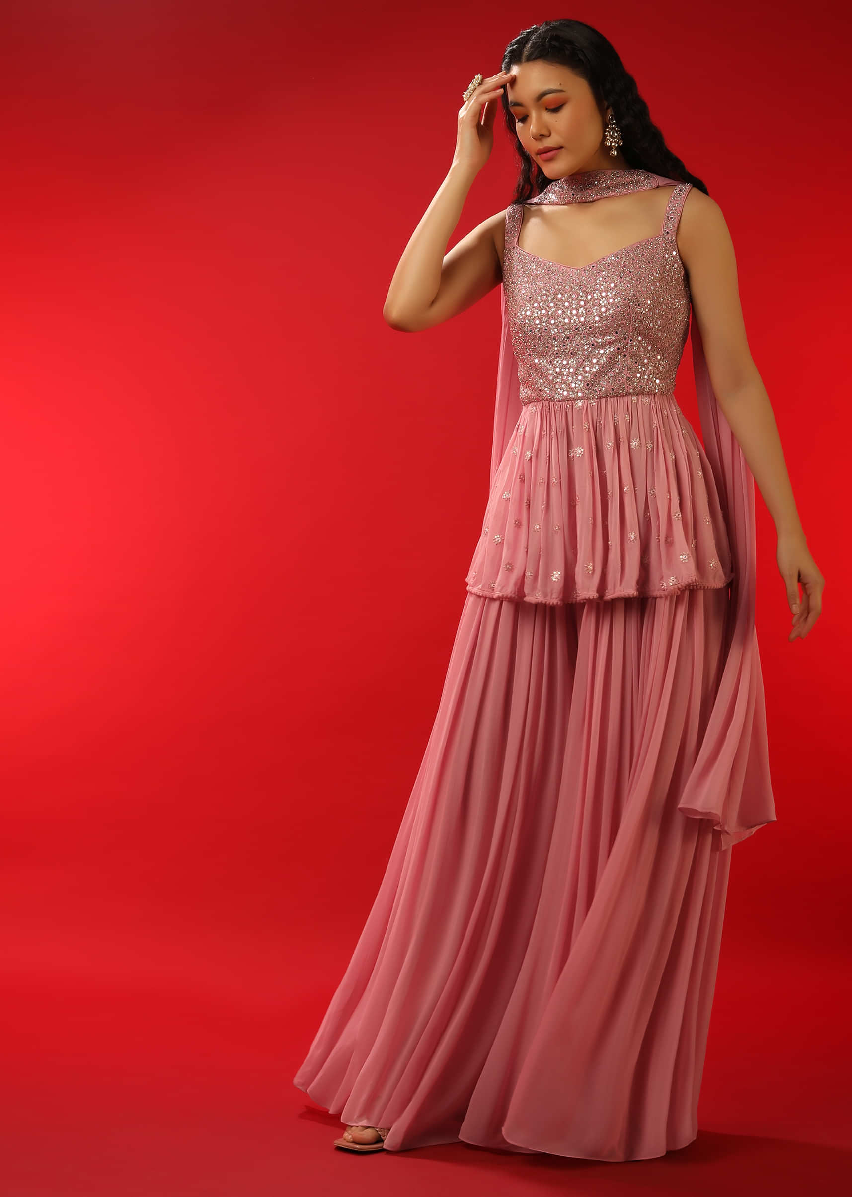 Rose Pink Palazzo And Peplum Suit In Georgette With Heavy Mirror Work On The Bodice  
