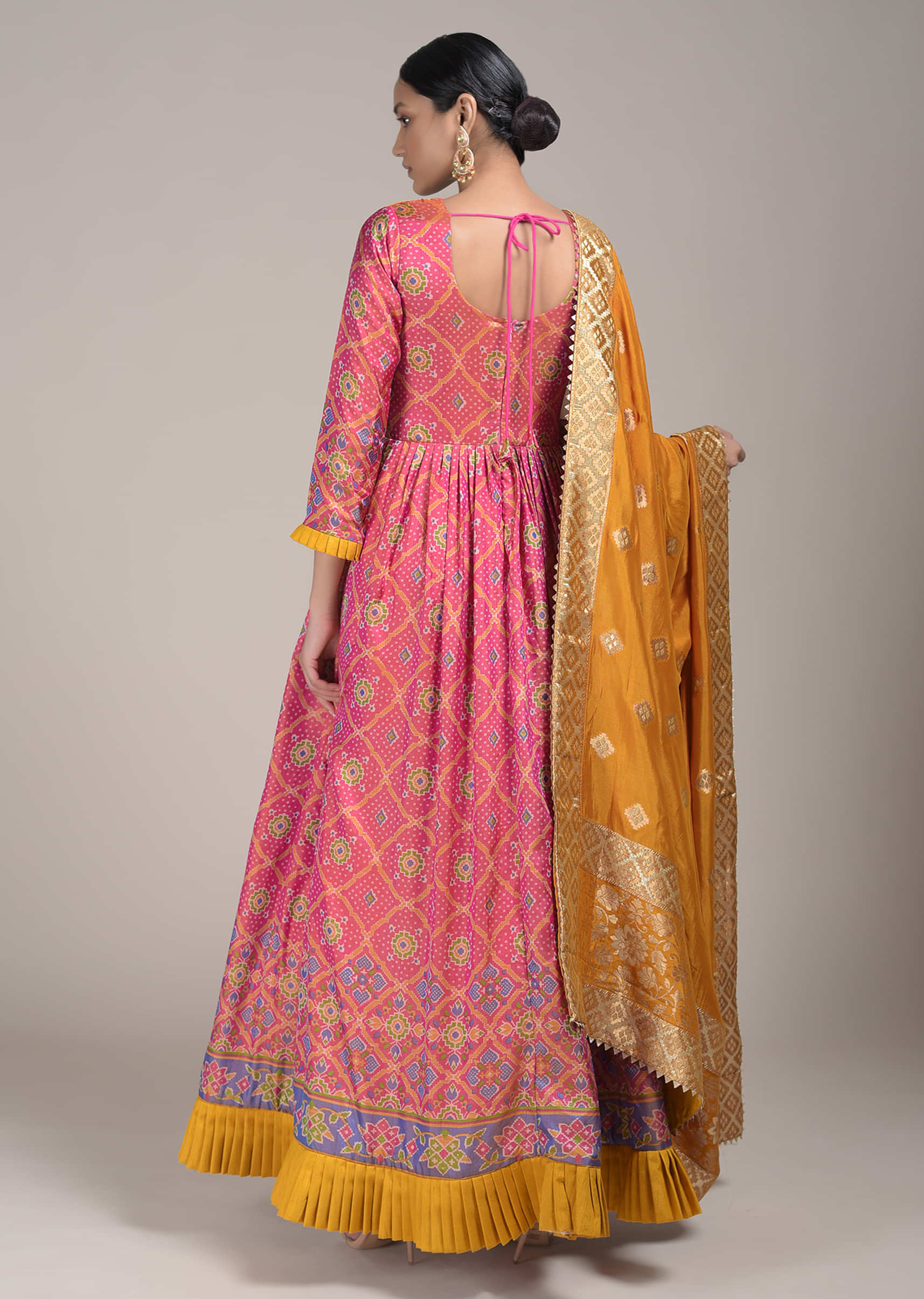 Rouge Pink Anarkali Suit In Silk With Bandhani And Patola Print And Contrast Mustard Frill  