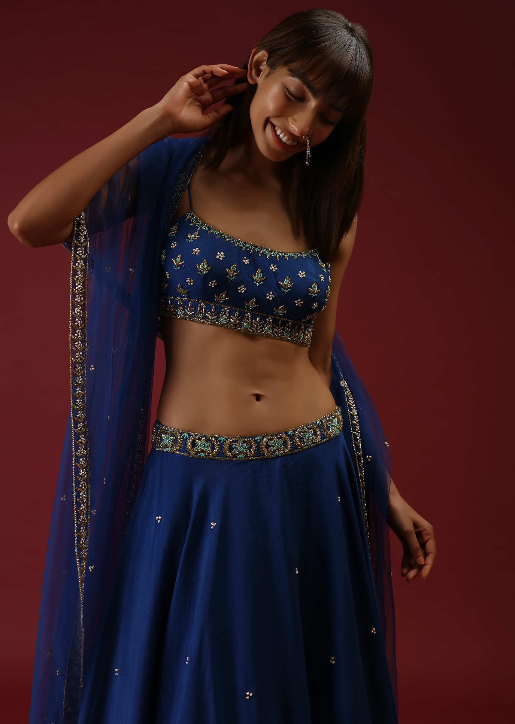 Royal Blue Lehenga Choli In Raw Silk With Hand Embroidered Butti Design Using Mint Sequins And Cut Dana Work 