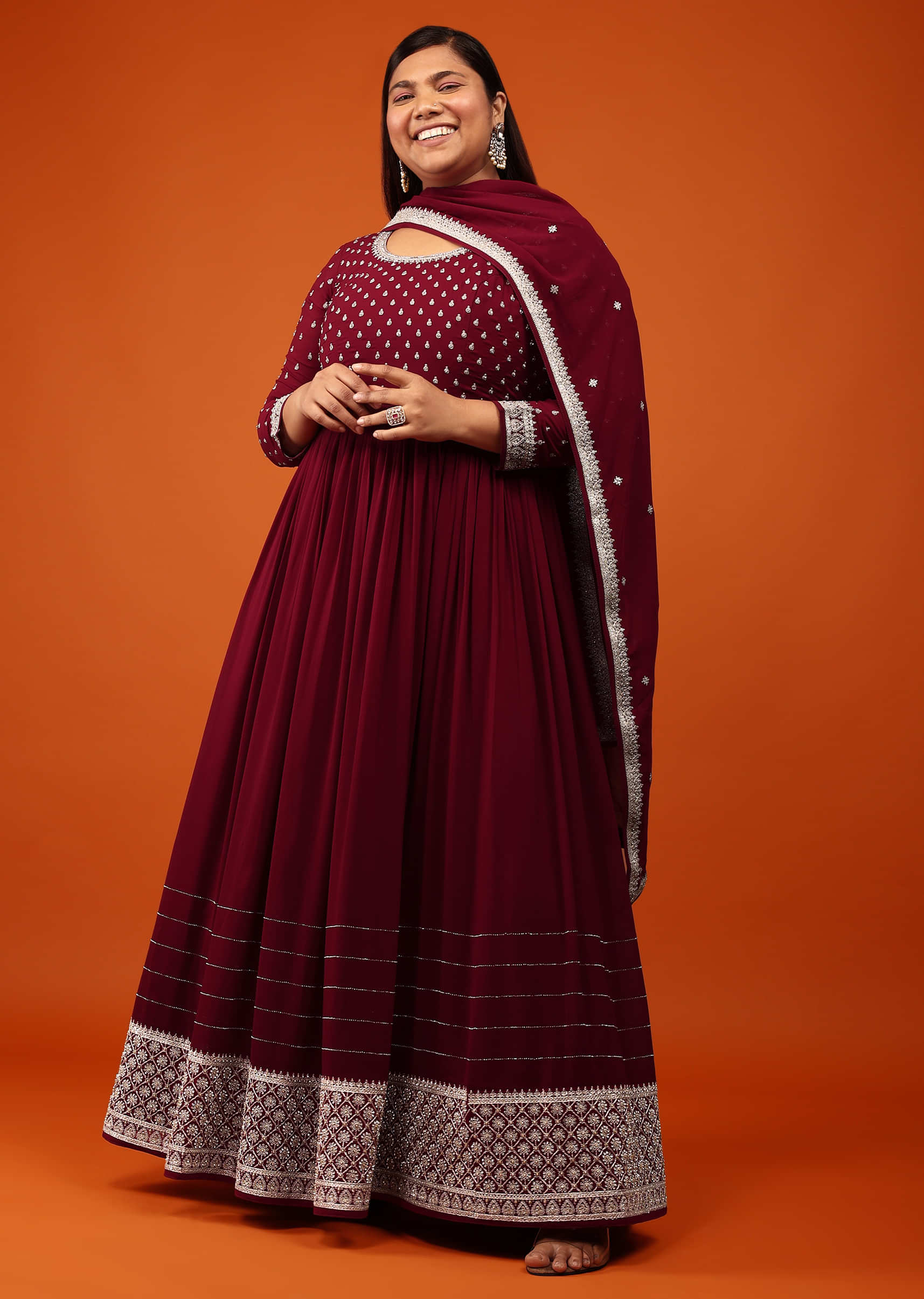 Ruby Wine Anarkali Suit In Georgette With Alluring Embroidery In Zari And Stone