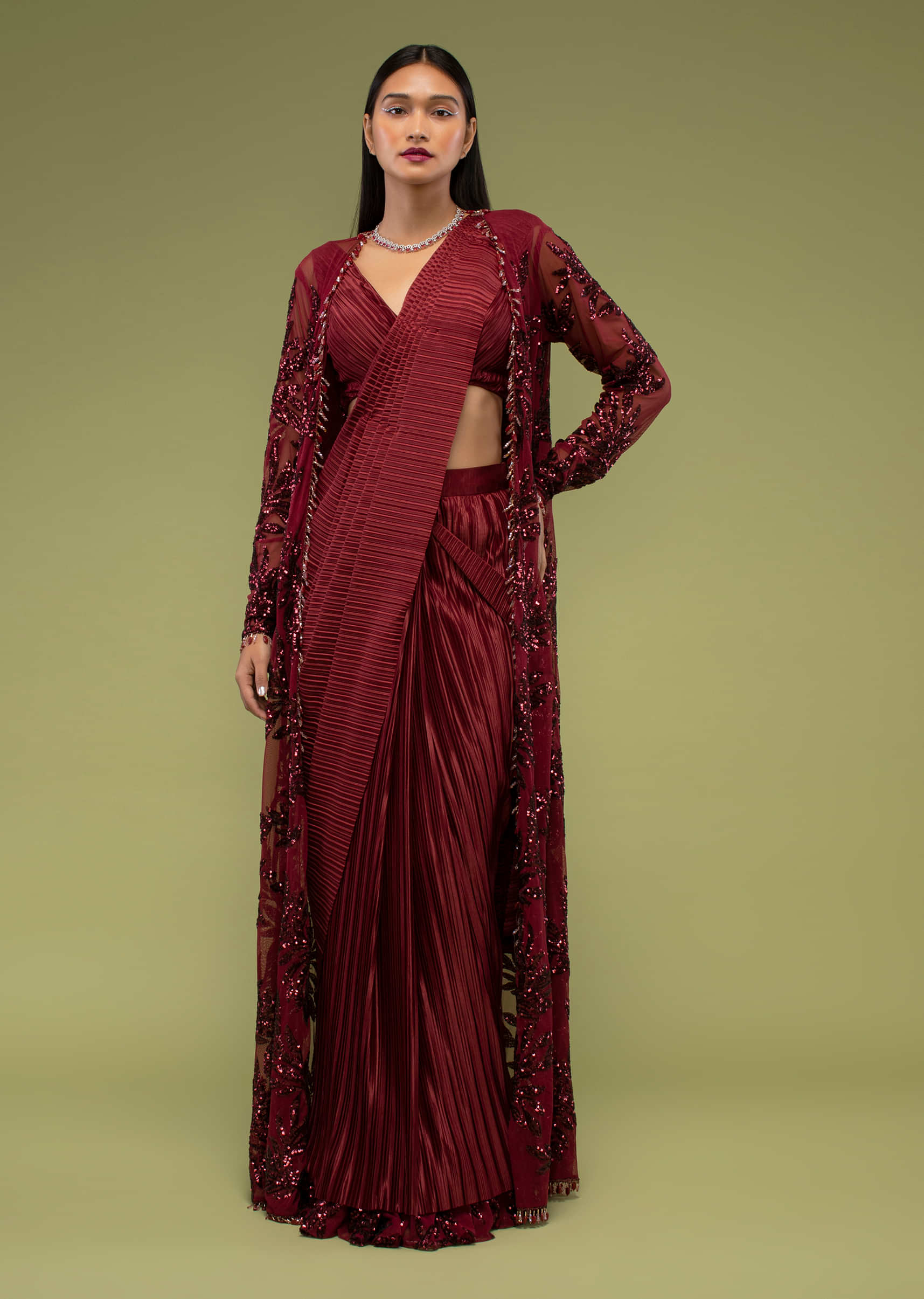 Rumba Red Ready Pleated Saree In The Crush,  Paired With A Jacket Crafted In Net  With Moti Fringes On The Border