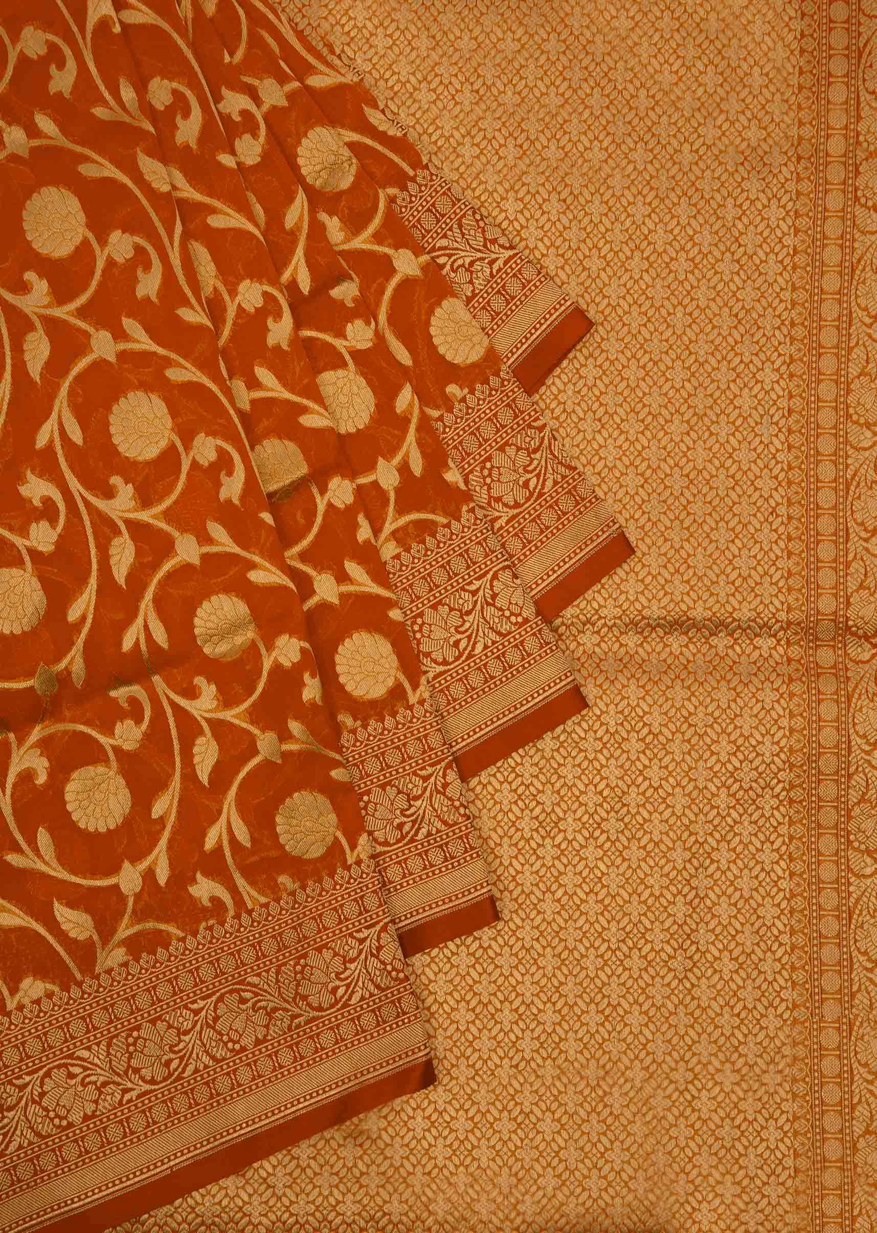 Rust floral weaved chanderi silk saree