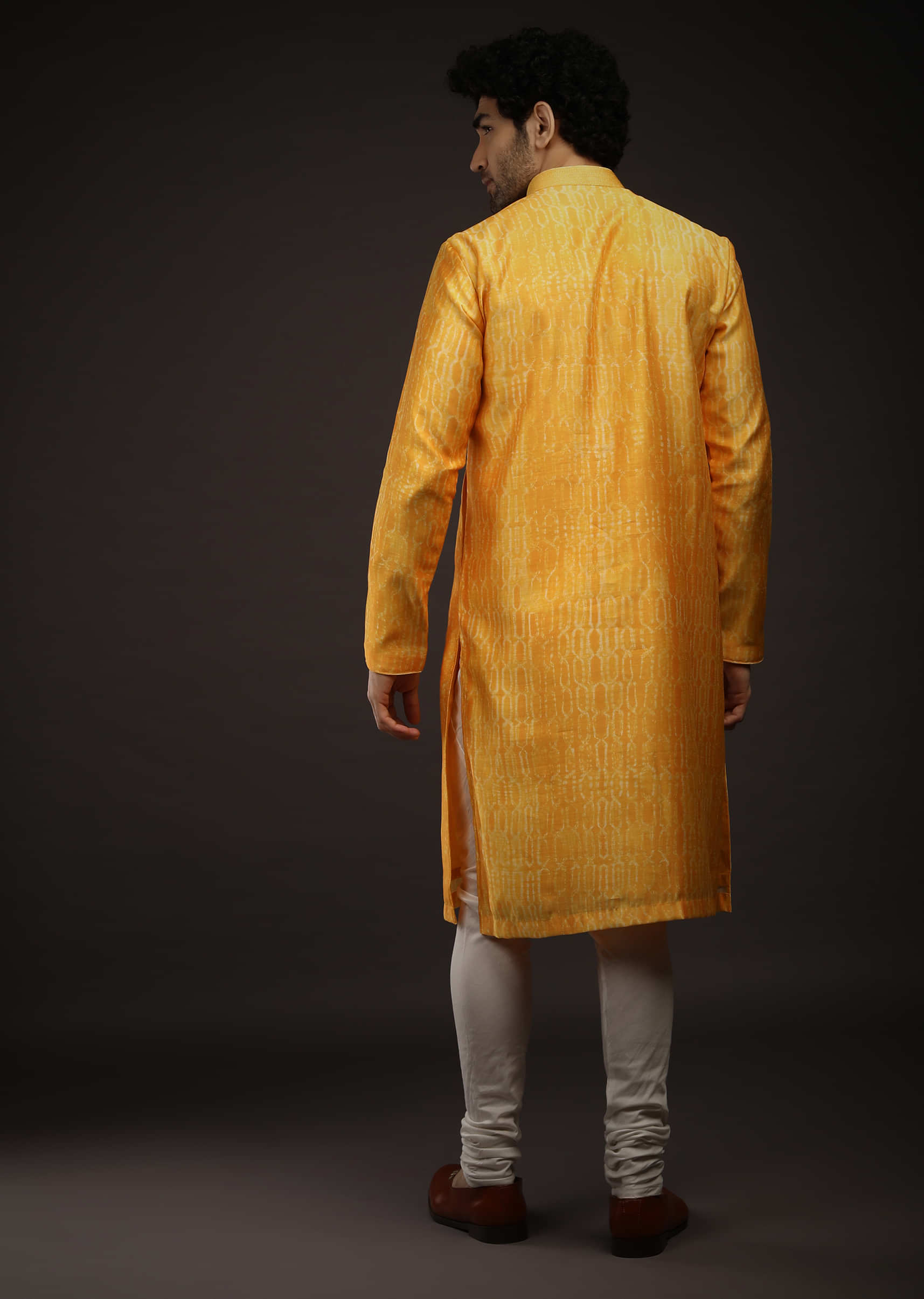 Saffron Yellow Kurta Set In Raw Silk With Tie Dye Design All Over And Resham Work On The Placket