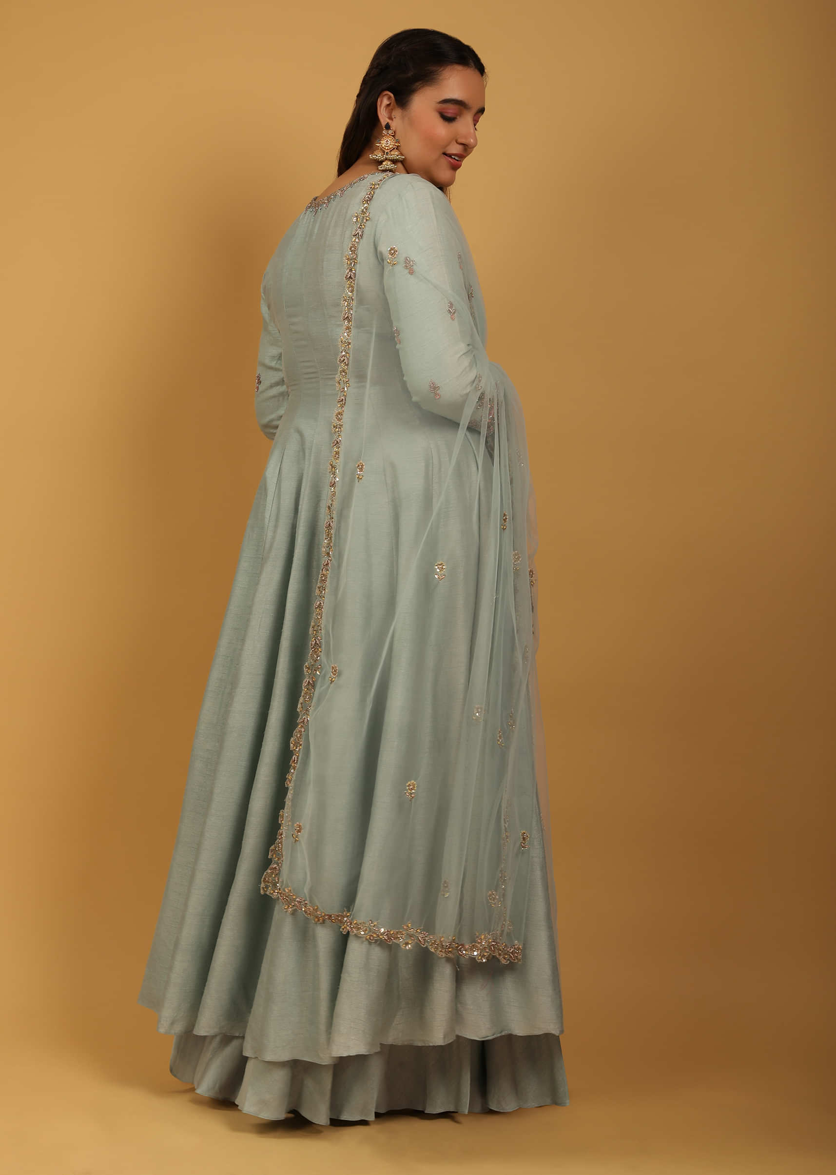 Sage Green Anarkali And Palazzo Suit In Raw Silk With Multi Colored Sequins And Cut Dana Embroidery On The Sleeves And Placket  