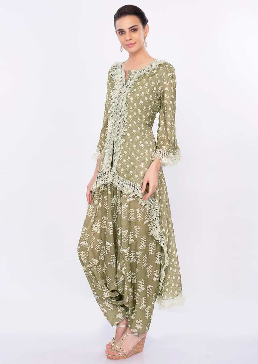 Sage green printed dhoti and top with crochet and fringes only on Kalki