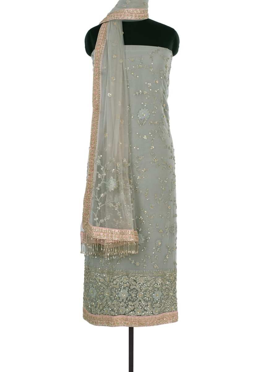 Sage green unstitch hard net suit in self cord floral jaal embroidery only on Kalki