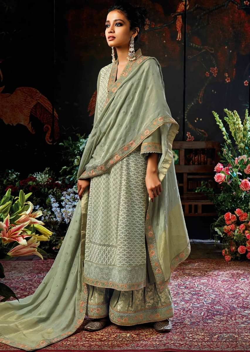 Sage green unstitched suit embellished in thread and resham embroidery 