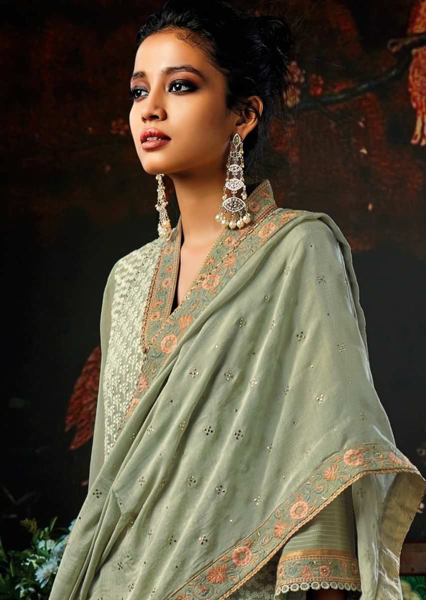 Sage green unstitched suit embellished in thread and resham embroidery 