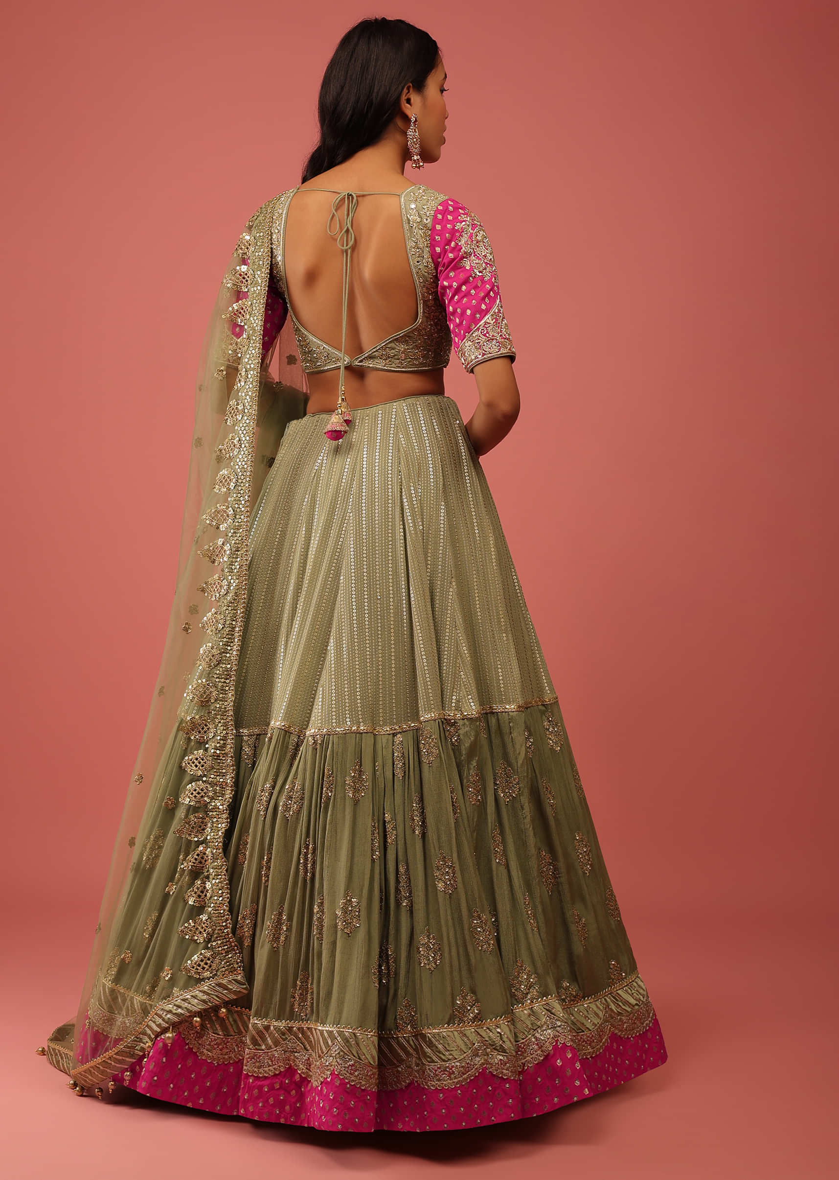 Moss Green Lehenga Choli With Sequins Embroidery And Contrasting Magenta Border And Sleeve Detailing