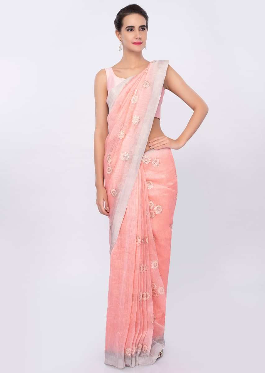 Salmon pink Linen saree with self thread embroidered butti  only on Kalki