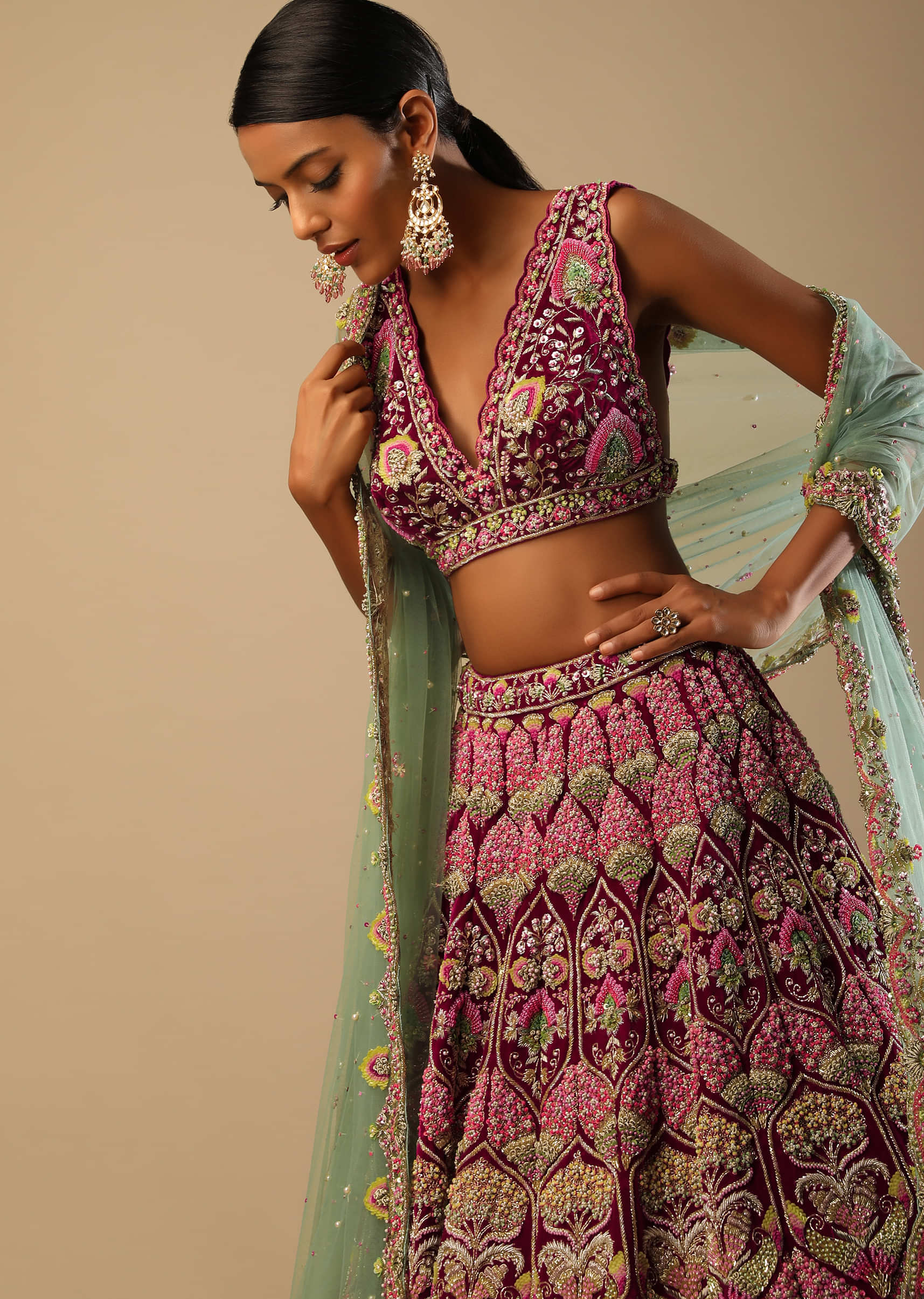Sangria Lehenga Choli In Velvet With Multi Colored Hand Embroidery In Intricate Moroccan And Floral Motifs 