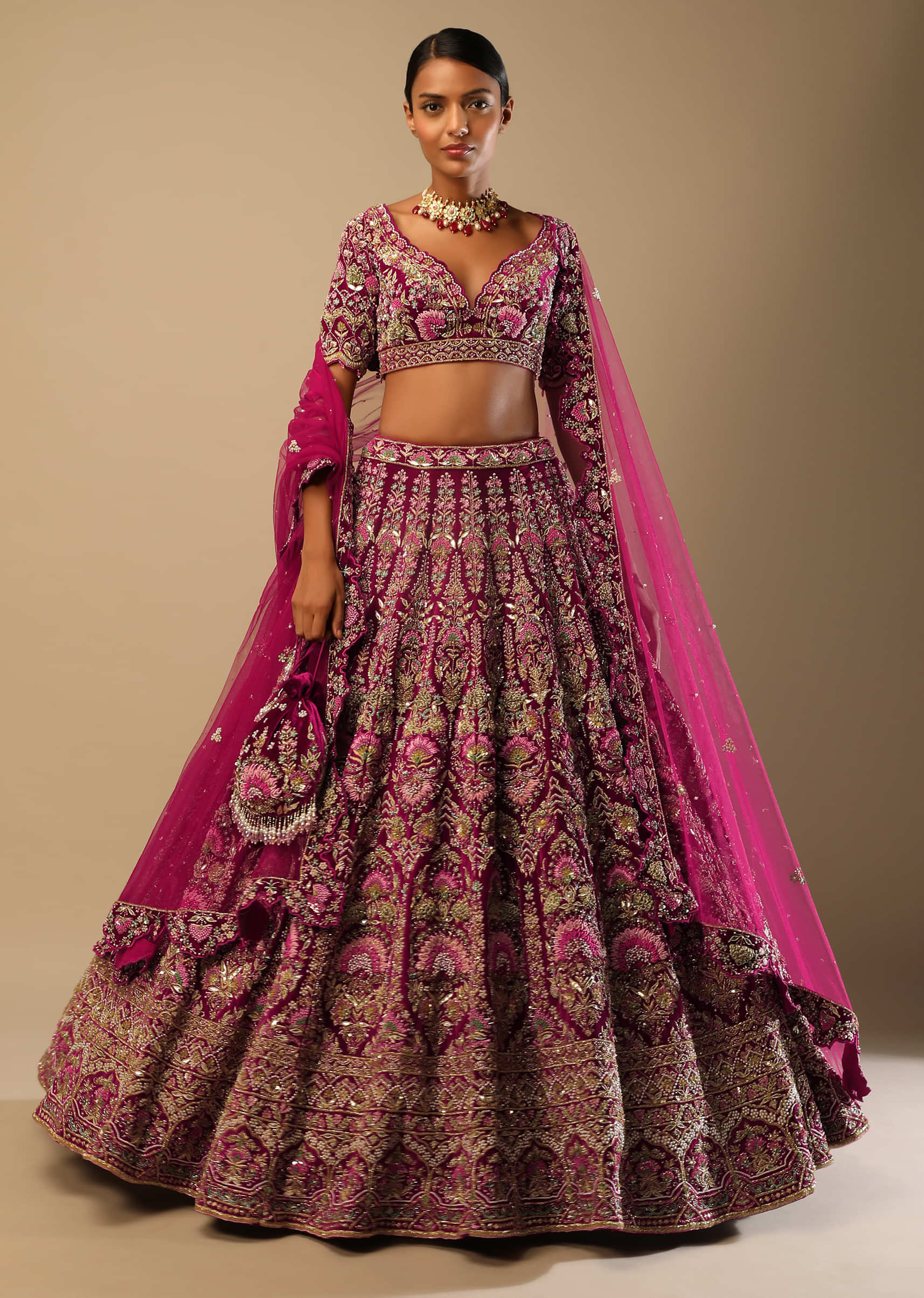 Sangria Velvet Lehenga Choli With Mughal Inspired Hand Embroidered Kalis Using Multi Colored Accents 