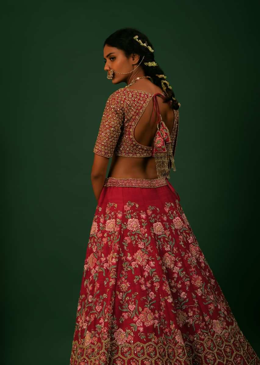 Scarlet Red Lehenga Choli With Colorful Resham And Zardosi Embroidered Flowers And Heavy Border With Honeycomb And Moroccan Motifs 