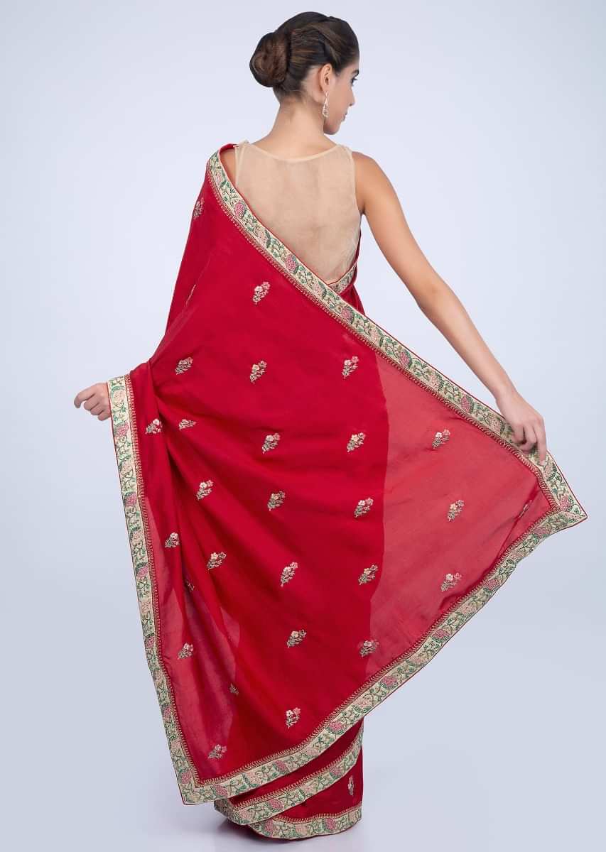 Scarlett red dupion silk saree with floral embroidered butti and border only on kalki