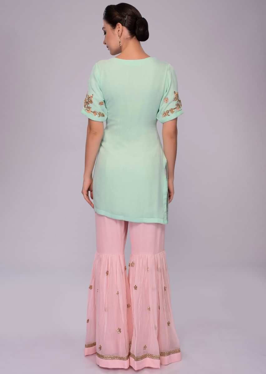 Sea green embroidered suit with pink sharara and net dupatta