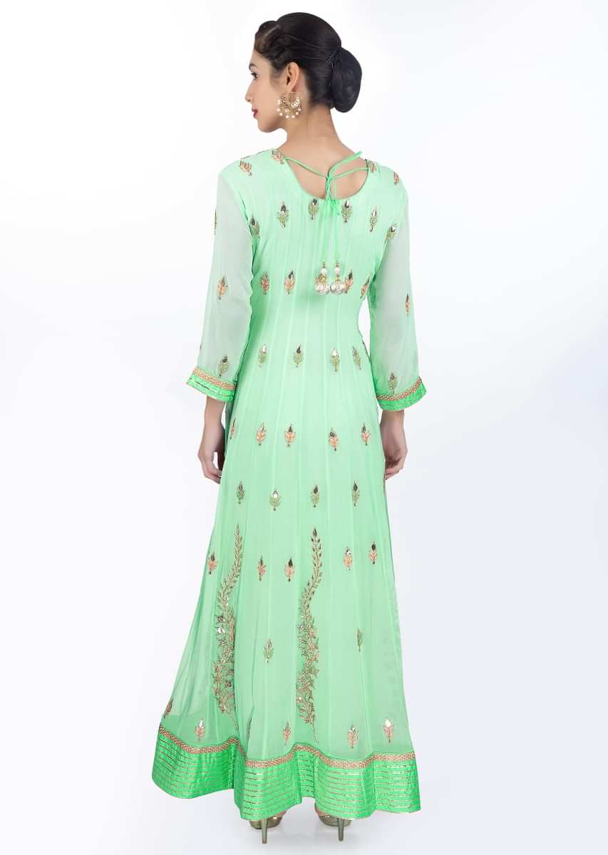 Sea green georgette anarkali dress paired with matching chiffon net dupatta 